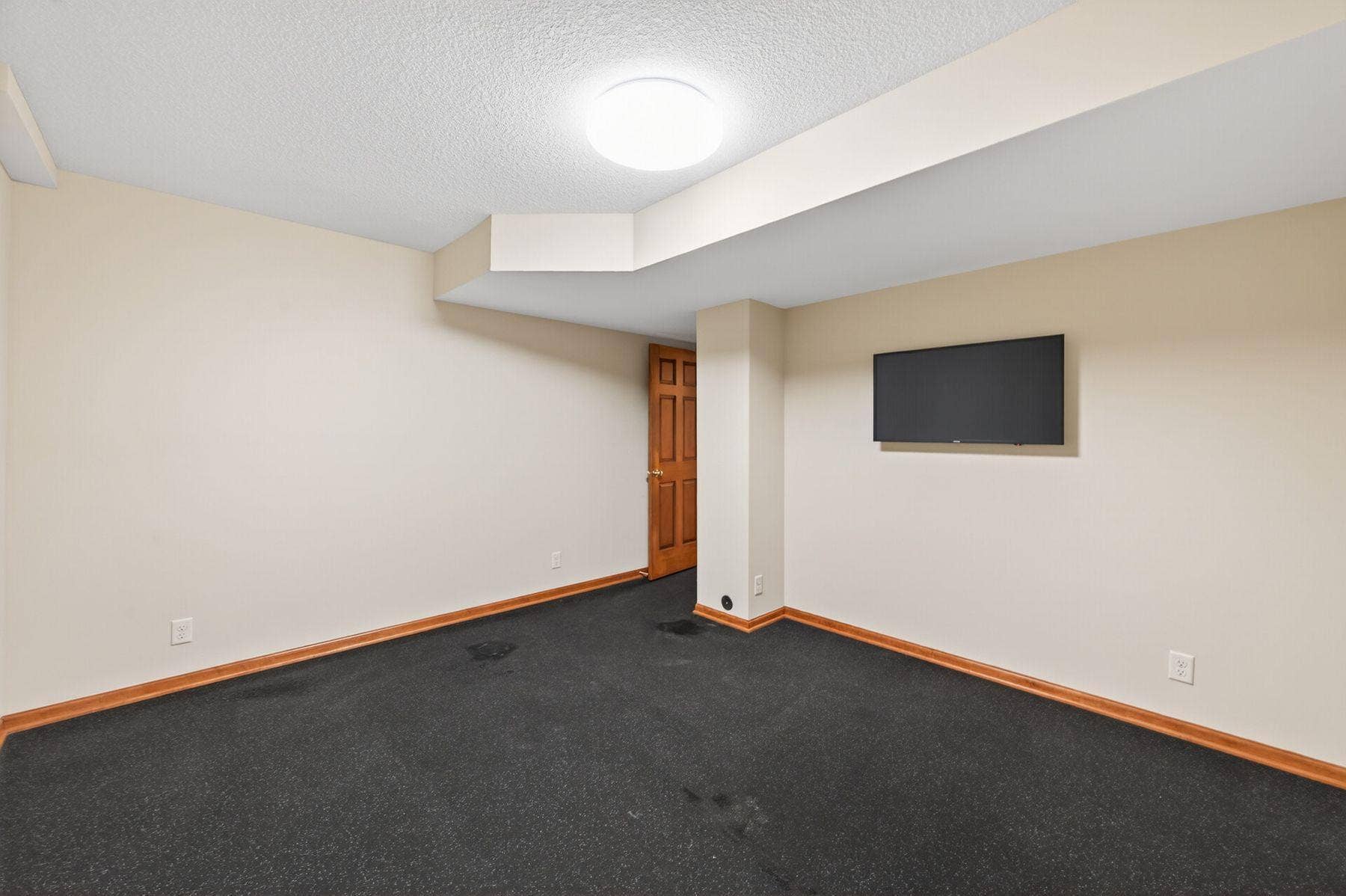 3034 Edgewater Drive, Woodbury, MN 55125 Lower level workout room