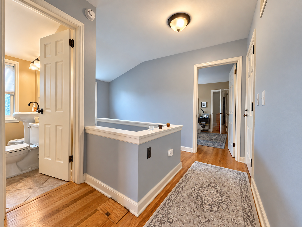 5921 Chicago Avenue S, 17, Minneapolis, MN 55417 Gather downstairs, retreat upstairs. The landing connects the bedrooms and bath on a separate level, giving the home a natural division between shared living space and personal space.