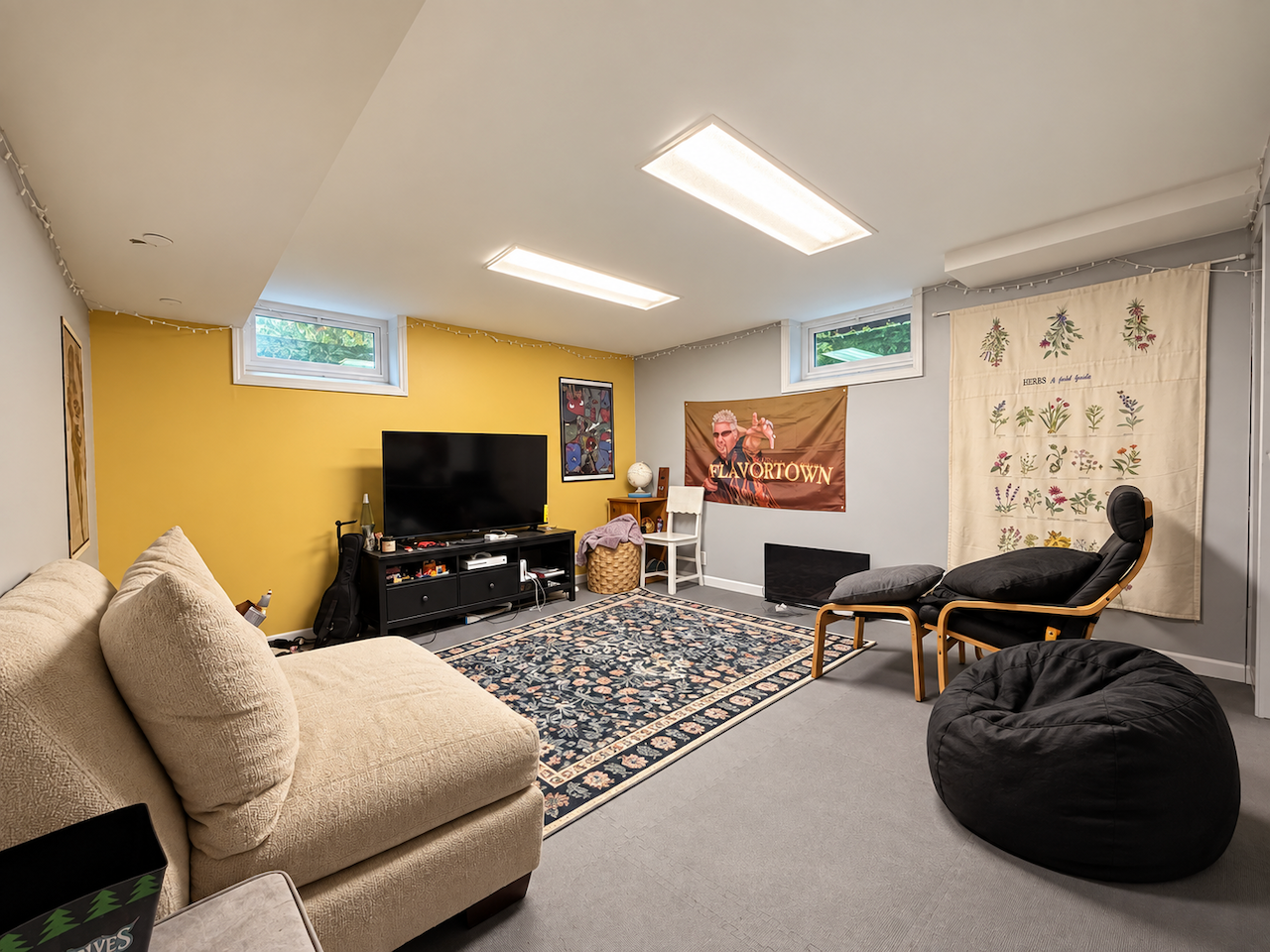 5921 Chicago Avenue S, 17, Minneapolis, MN 55417 Movie night, game day or a place to catch up with friends. This carpeted lower-level living space has room for a sofa and extra seating, with two high windows bringing in natural light.