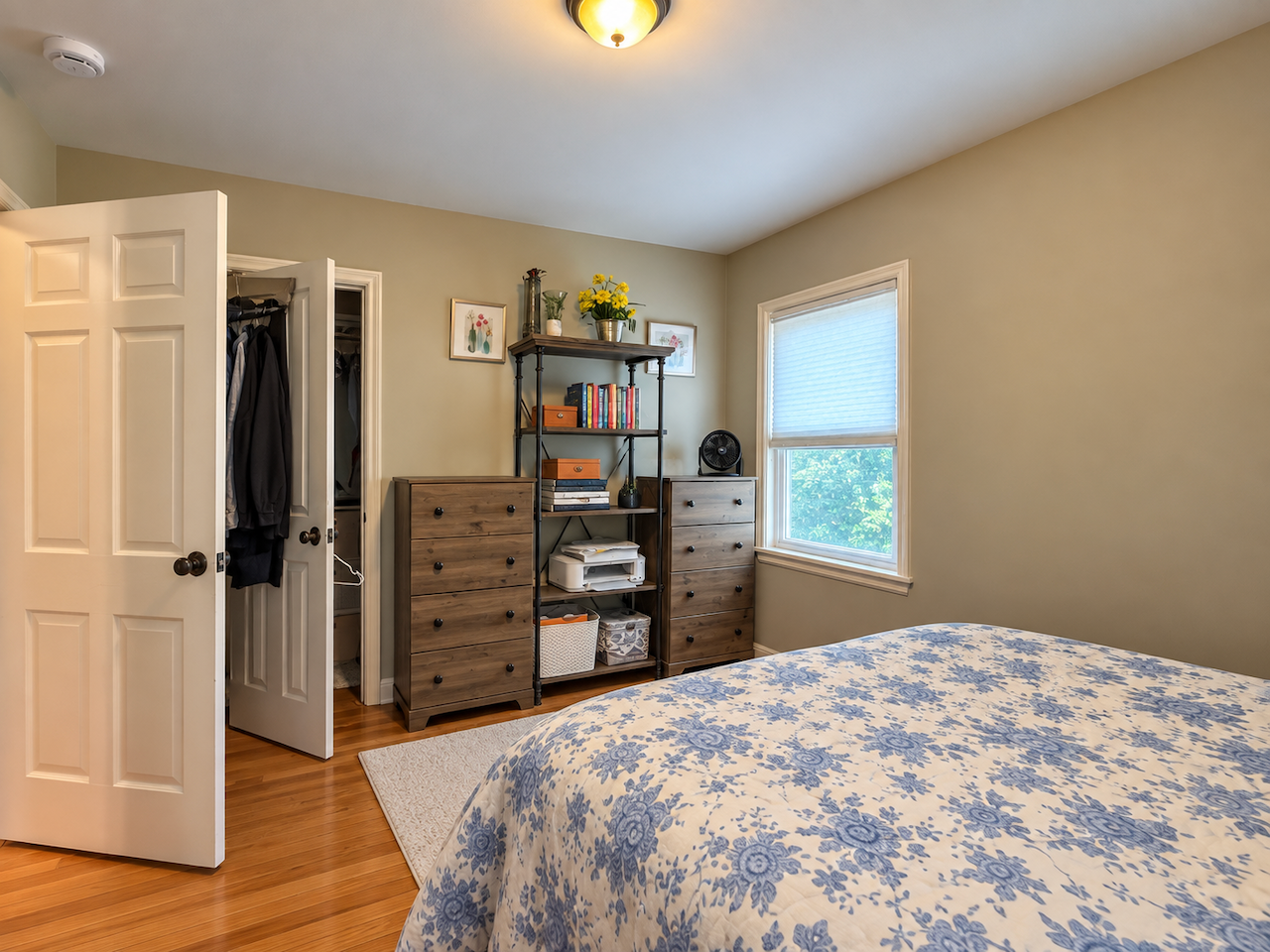 5921 Chicago Avenue S, 17, Minneapolis, MN 55417 Getting ready is easier when everything has a place. Closet storage and room for dressers keep clothes close at hand, while an insulated window brings in plenty of light into this wood-floored bedroom.