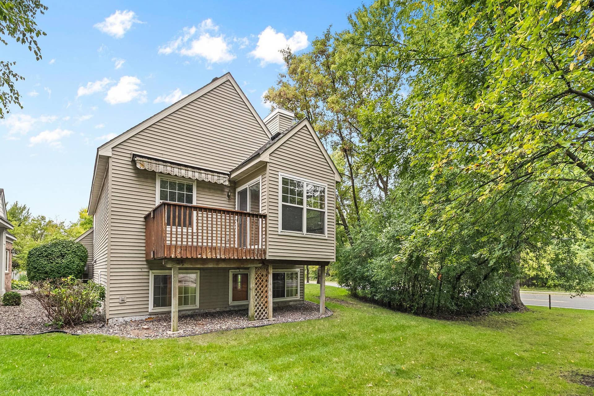 3848 Linden Avenue, White Bear Lake, MN 55110 Sunroom and deck off the back of the property.