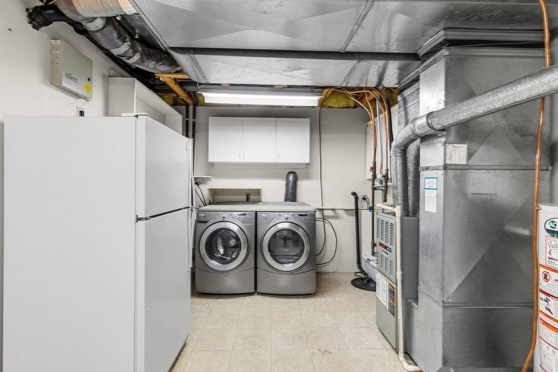 3848 Linden Avenue, White Bear Lake, MN 55110 Laundry/mechanical room. High end washer and dryer.