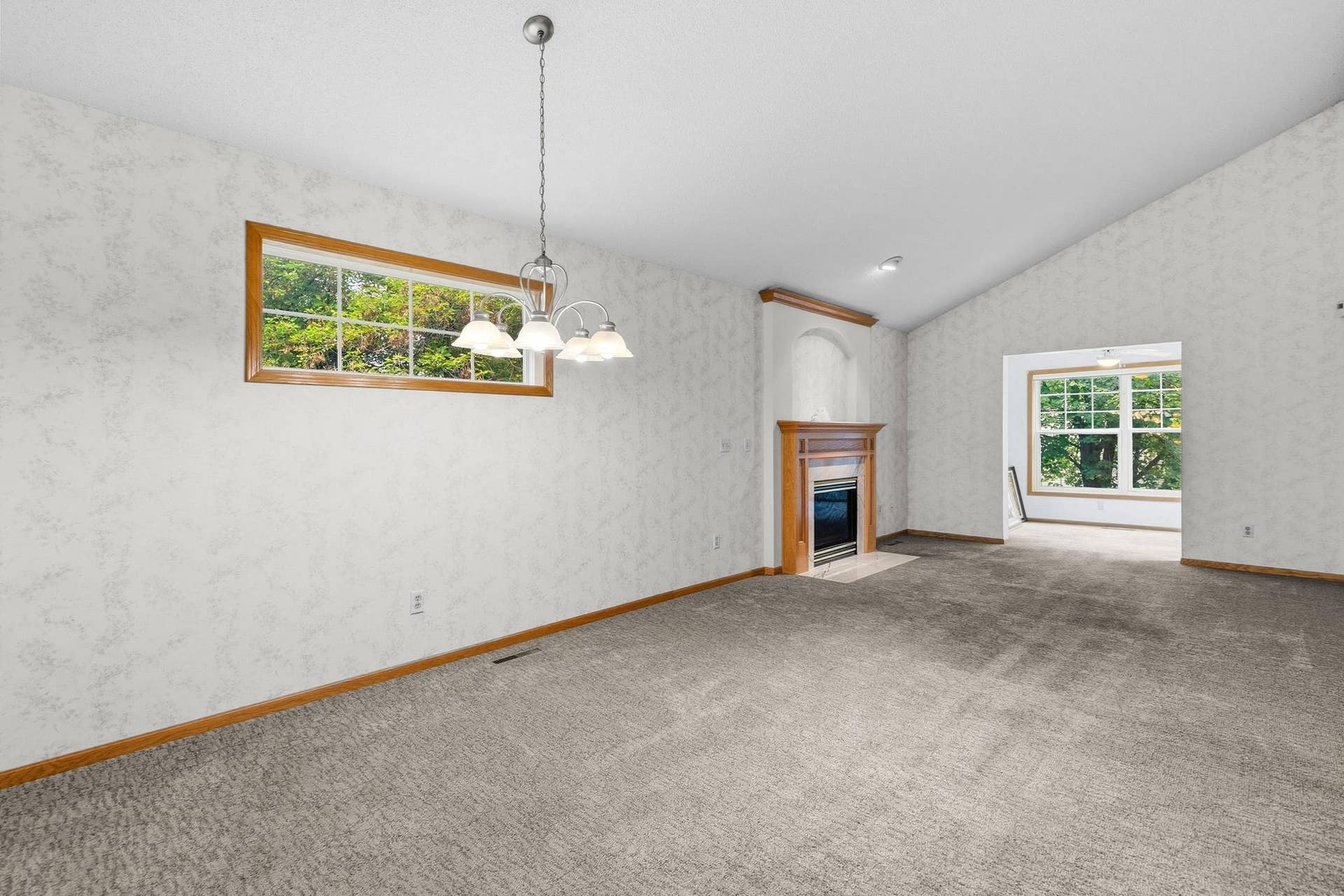 3848 Linden Avenue, White Bear Lake, MN 55110 Dining/Living room with a gas fireplace.