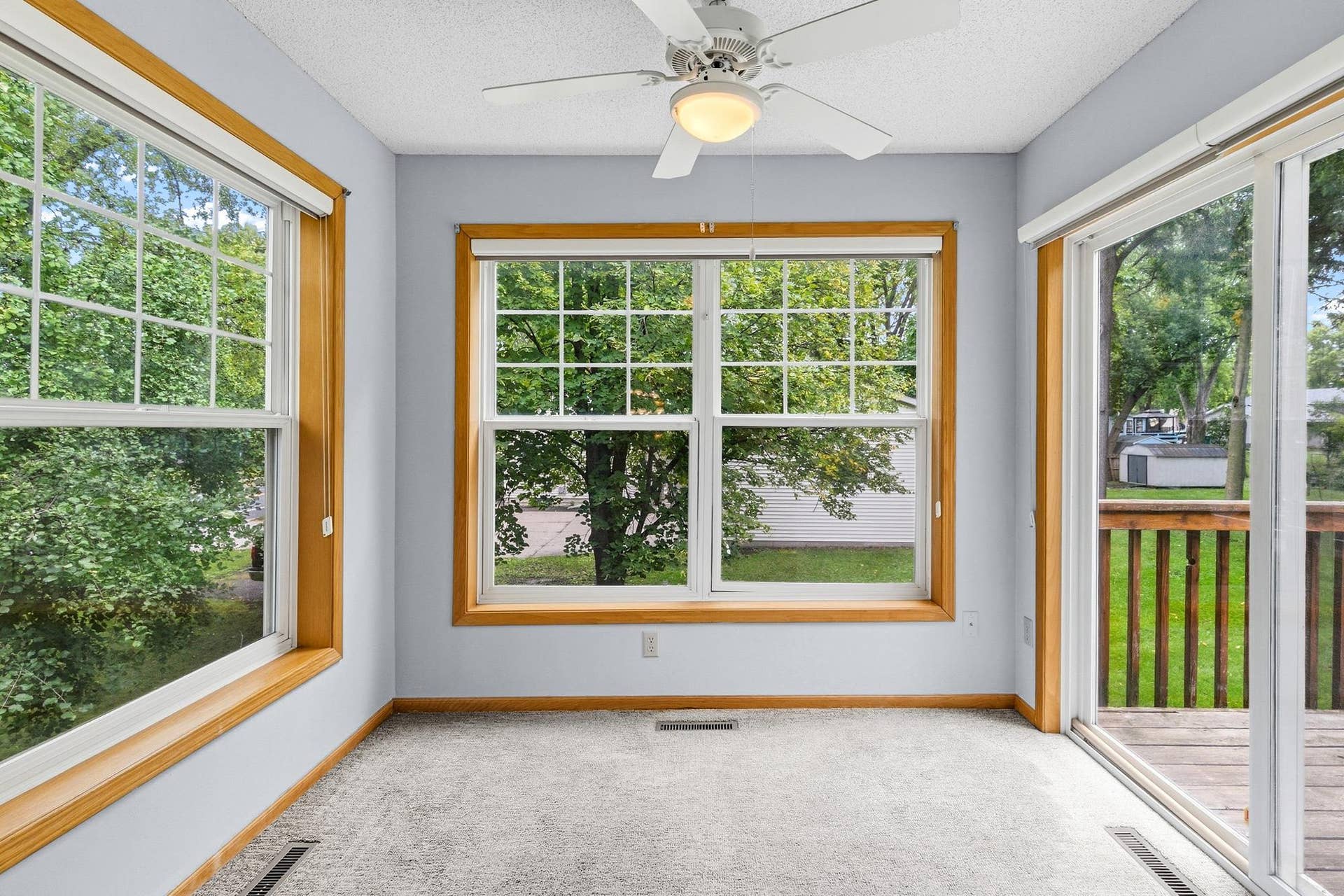 3848 Linden Avenue, White Bear Lake, MN 55110 Bright and sunny porch perfect for morning coffee.