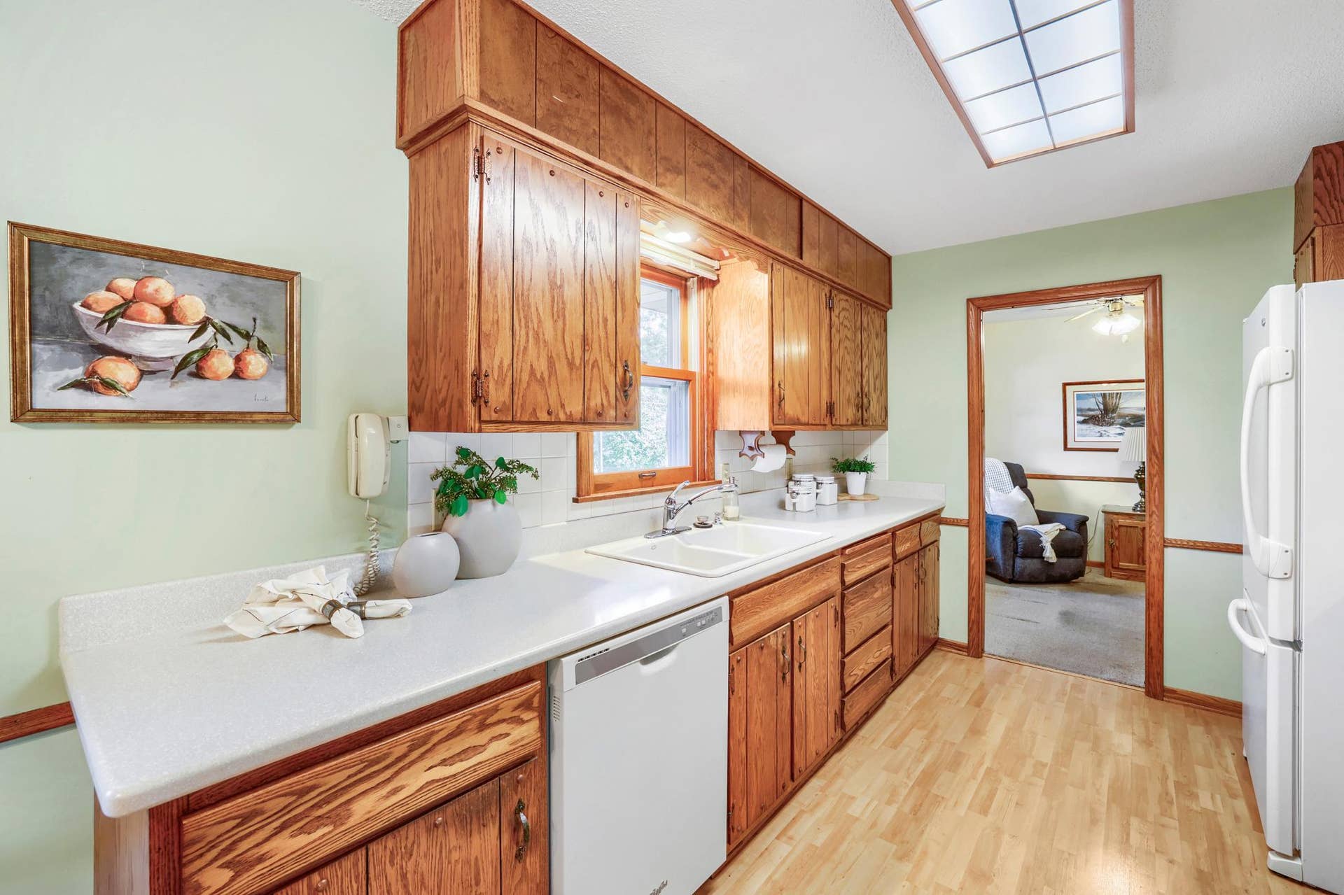 8901 Fremont Avenue S, Bloomington, MN 55420 Kitchen has a convenient connection to the third bedroom through a space-saving pocket door. Its a fun little bonus for anyone using this room as a bedroom or guest spacelate-night snacks are only a few steps away!