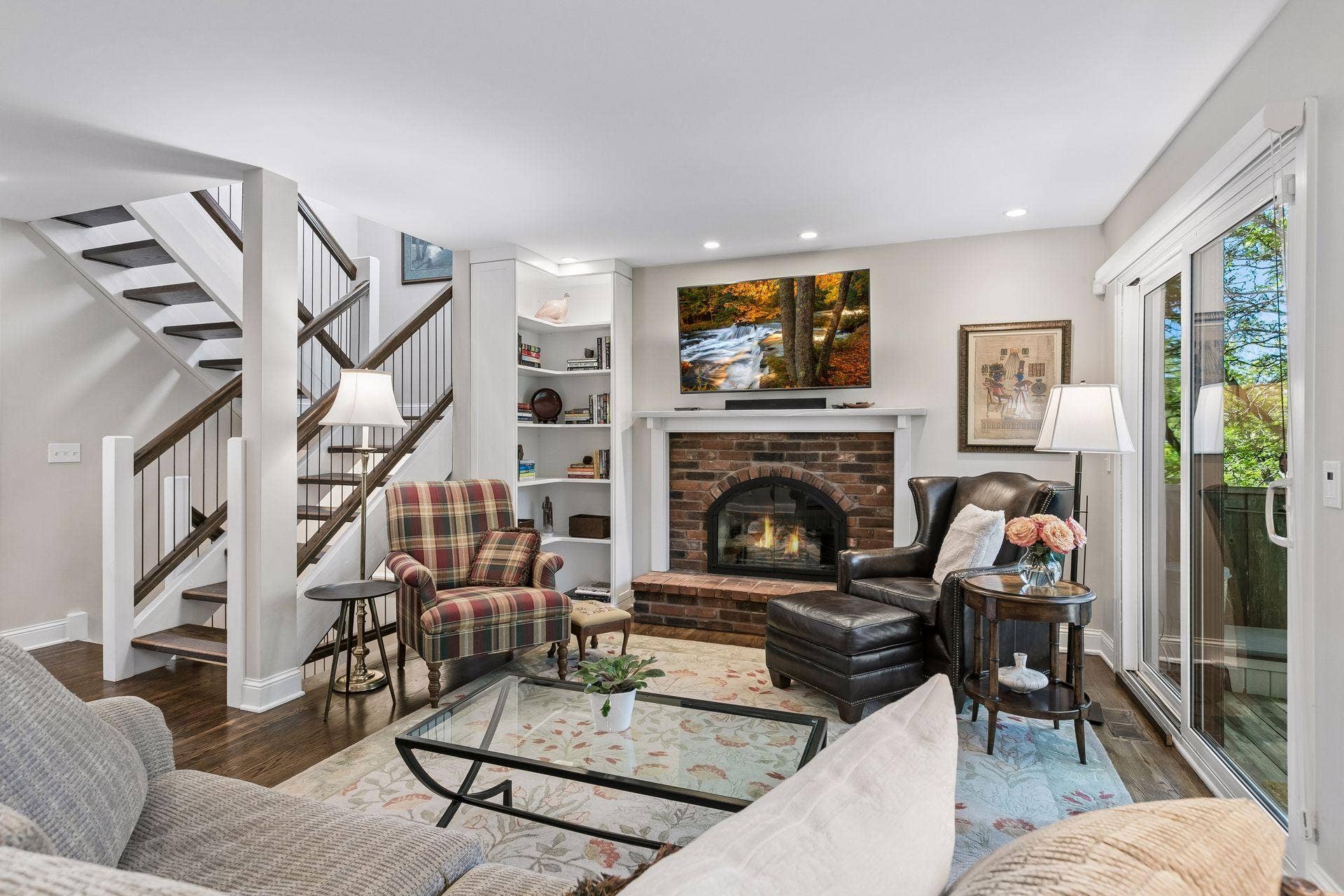 1952 Dupont Avenue S, 46, Minneapolis, MN 55403 Living room is well appointed with gas fireplace, built in bookcase, and access to the backyard patio