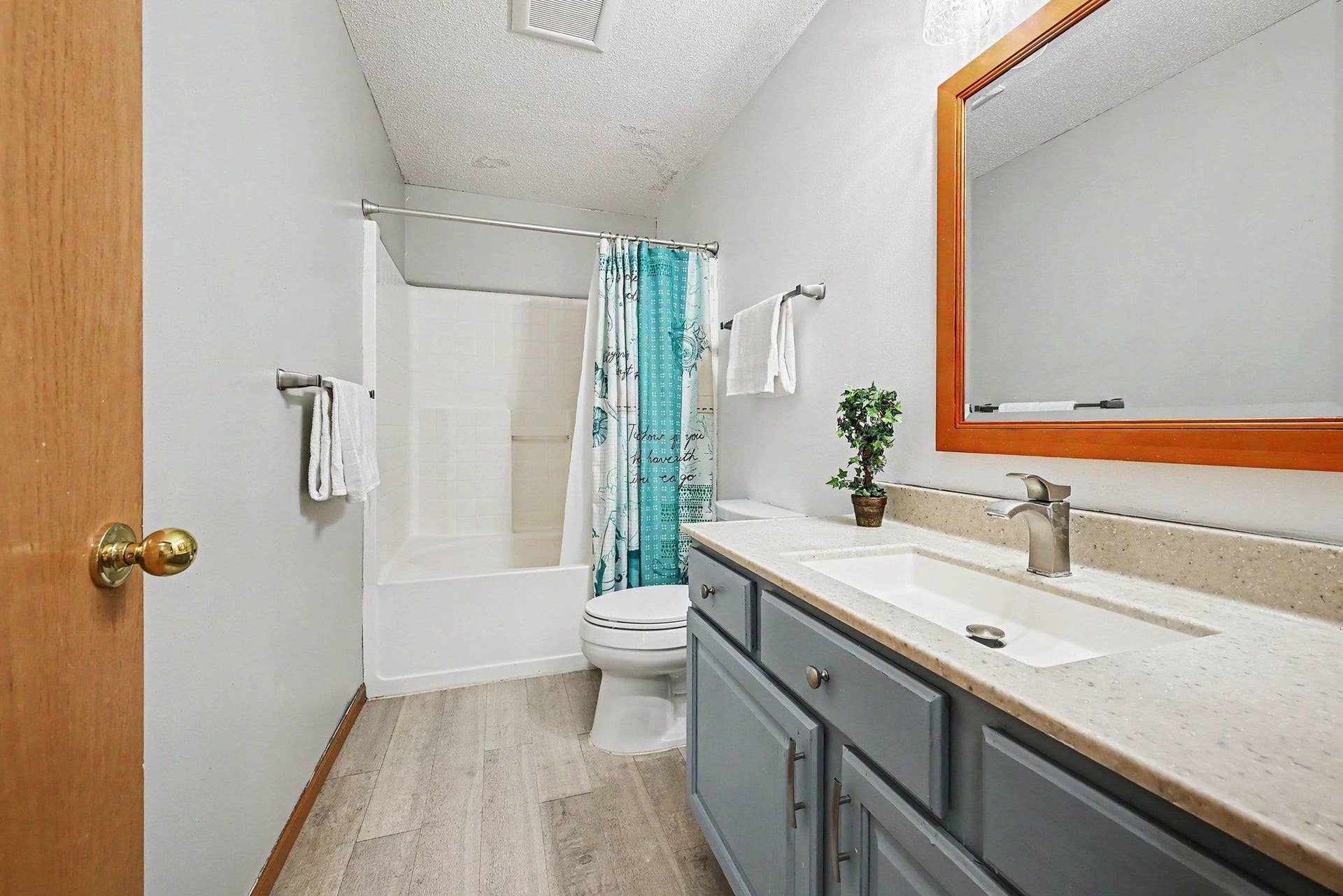 2466 Lone Eagle Trail, Woodbury, MN 55129 Main hallway bath with oversized sink and countertop.
