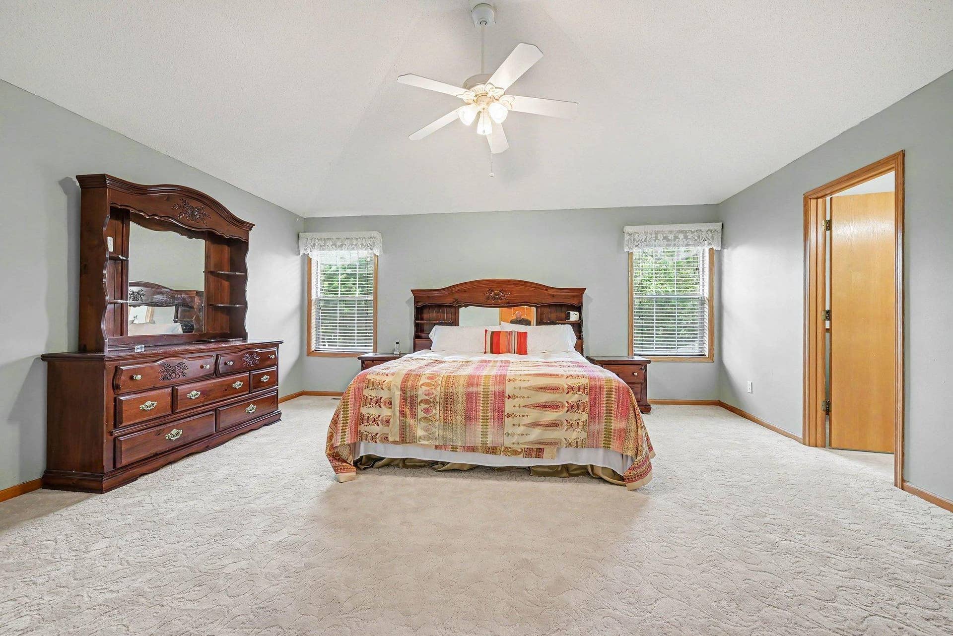 2466 Lone Eagle Trail, Woodbury, MN 55129 Primary bedroom with tray vault ceiling, newer carpet.