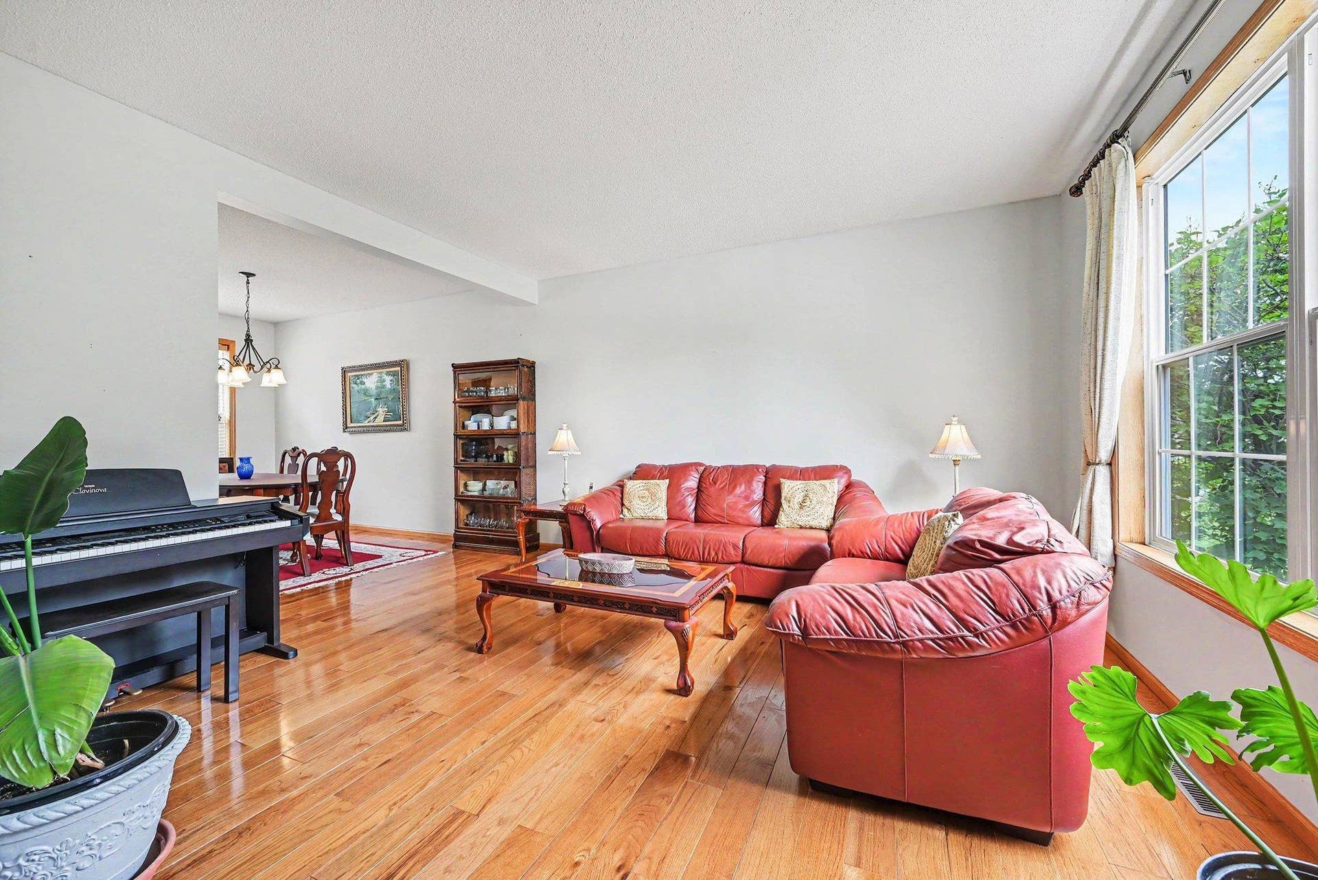 2466 Lone Eagle Trail, Woodbury, MN 55129 As you enter the home the sitting room is to your right, lots of morning light.