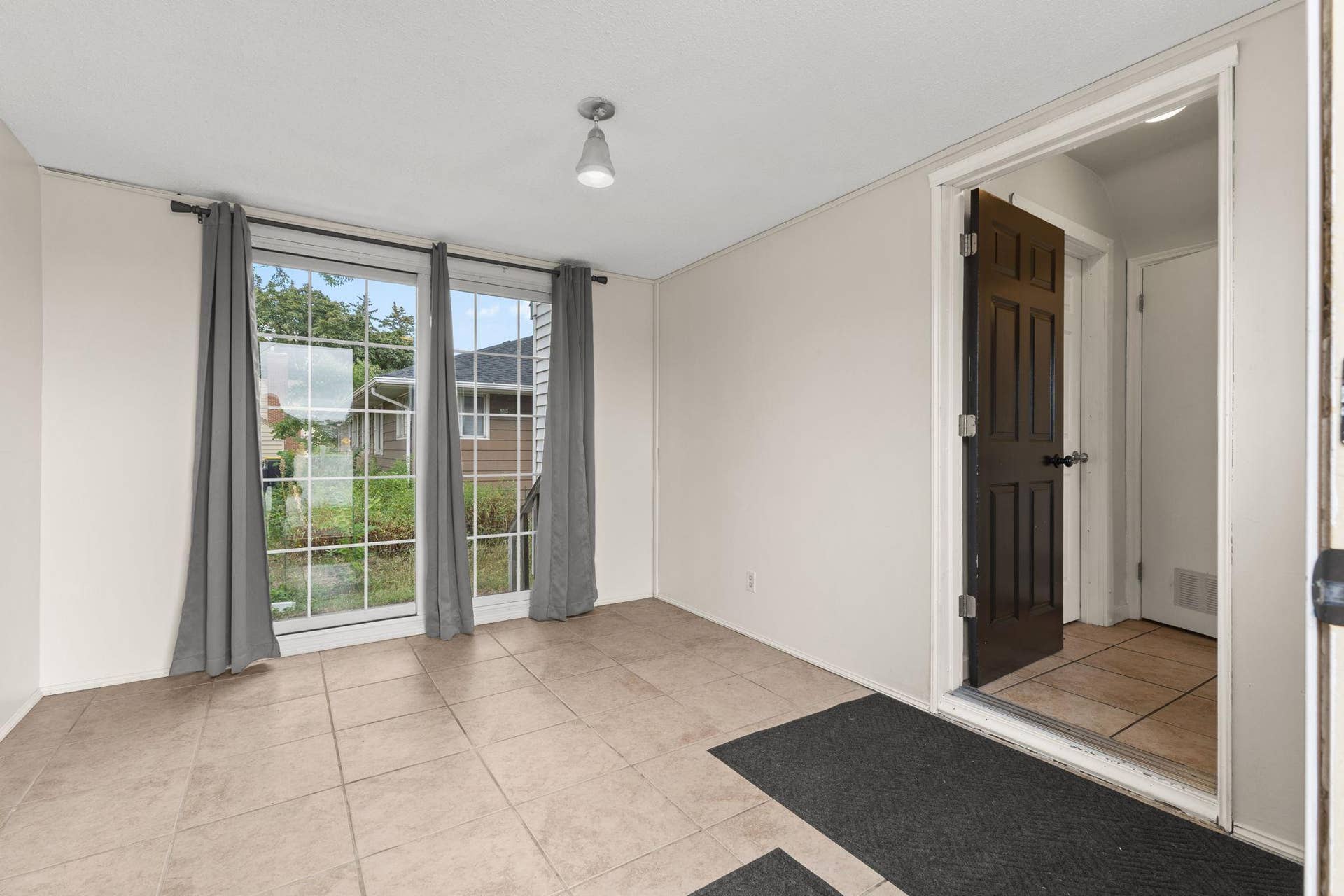 5301 Brooklyn Boulevard, Brooklyn Center, MN 55429 Spacious and Sun filled Breezeway