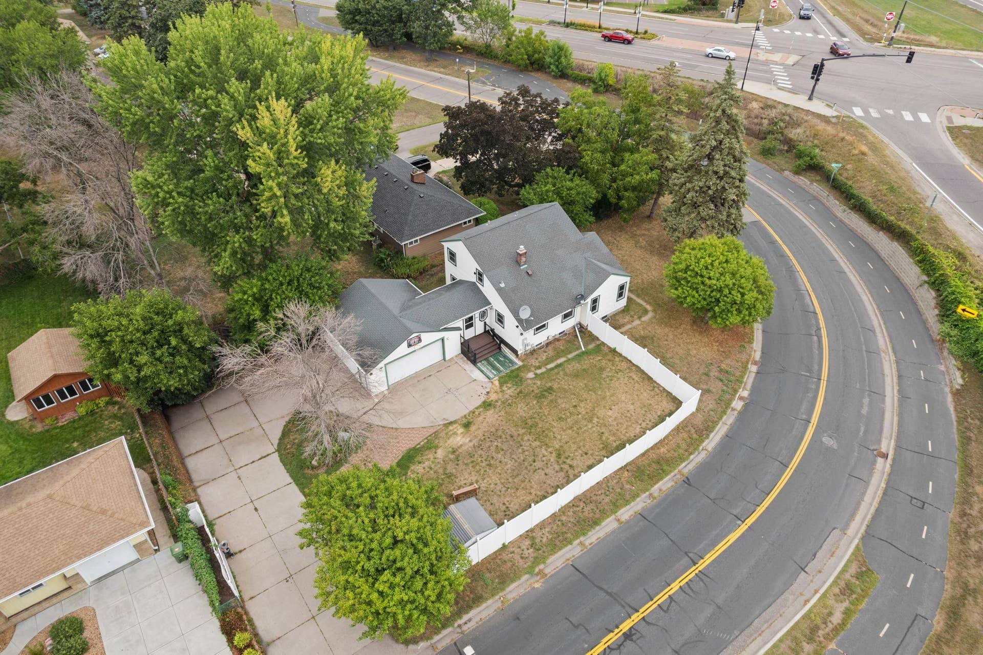 5301 Brooklyn Boulevard, Brooklyn Center, MN 55429 Generous Corner Lot, Fully Fenced with Ample Parking