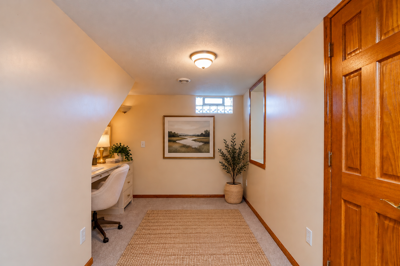 Cozy office nook under the stairs!