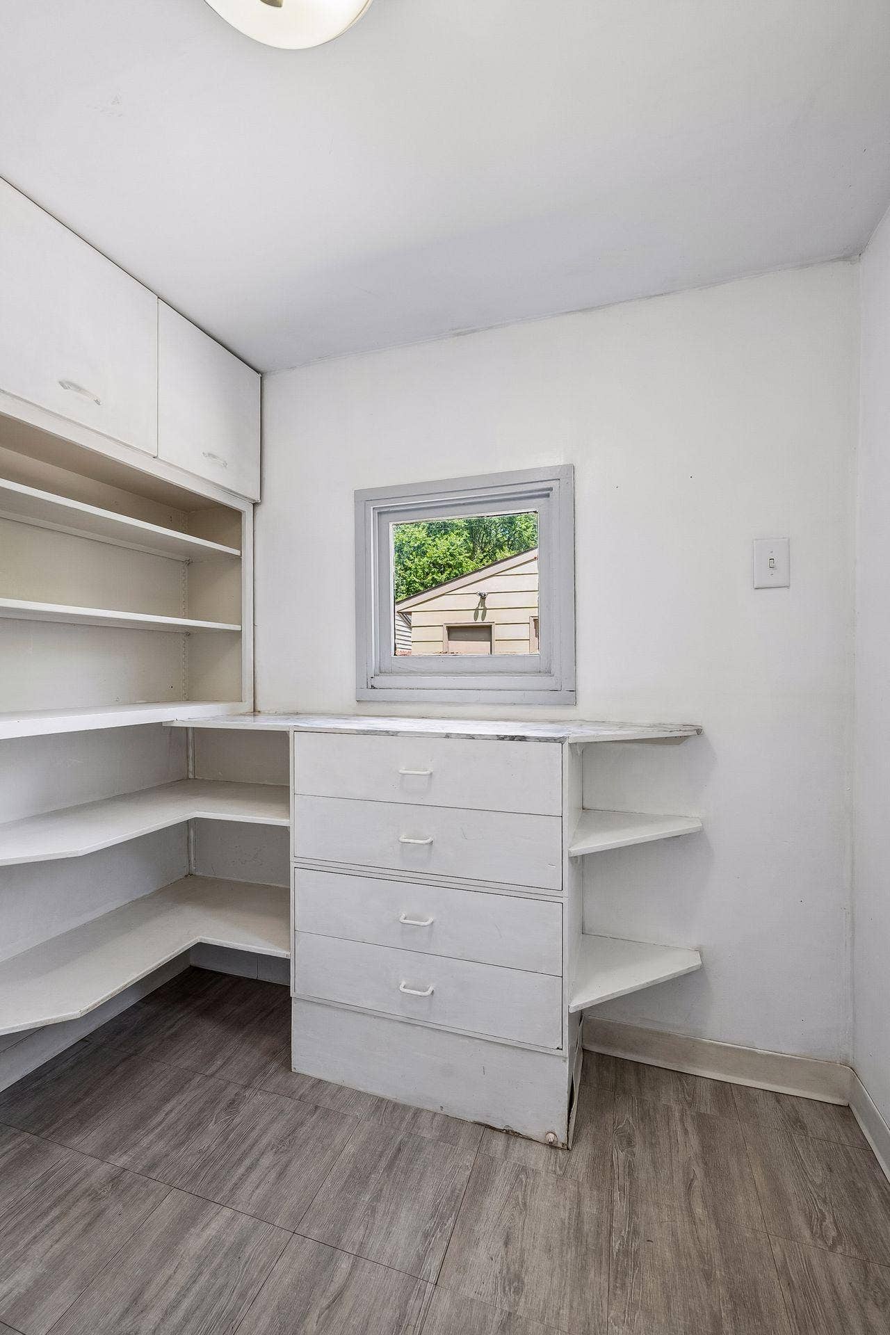 3014 E 26th Street, 67, Minneapolis, MN 55406 Rear mudroom with built-in shelving off the kitchen and walks out to the backyard.