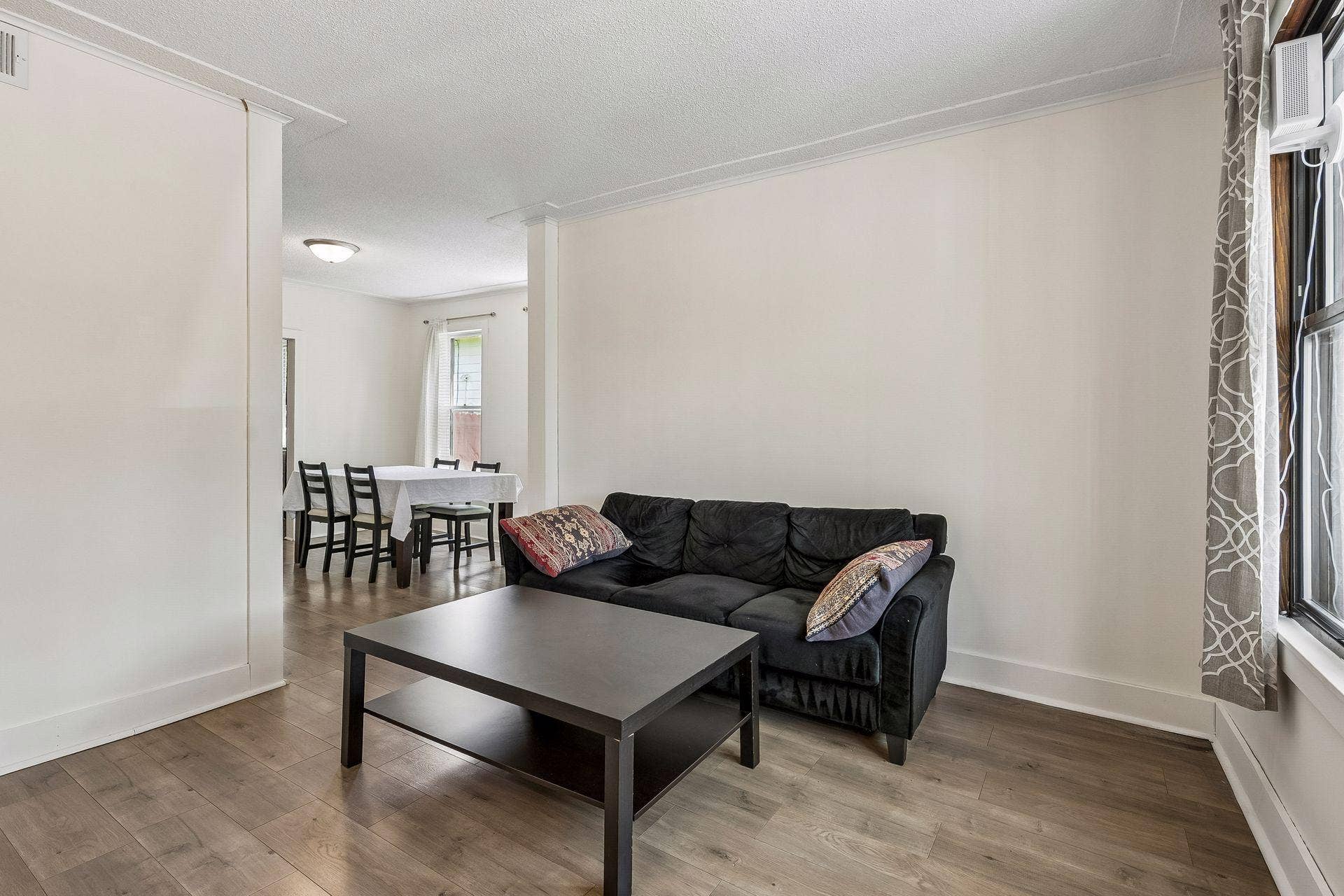3014 E 26th Street, 67, Minneapolis, MN 55406 The main floor features high ceilings with a racetrack design, luxury vinyl plank flooring and oversized tall windows. Living room was painted in 2025.