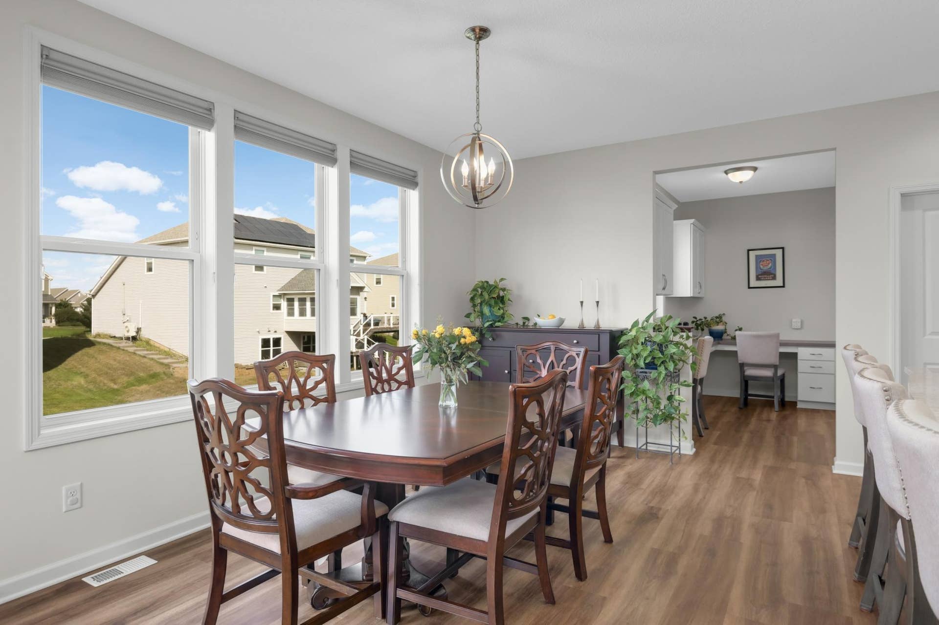 9354 Summerlin Road, Woodbury, MN 55129 Dining area features custom Hunter Douglas window treatments