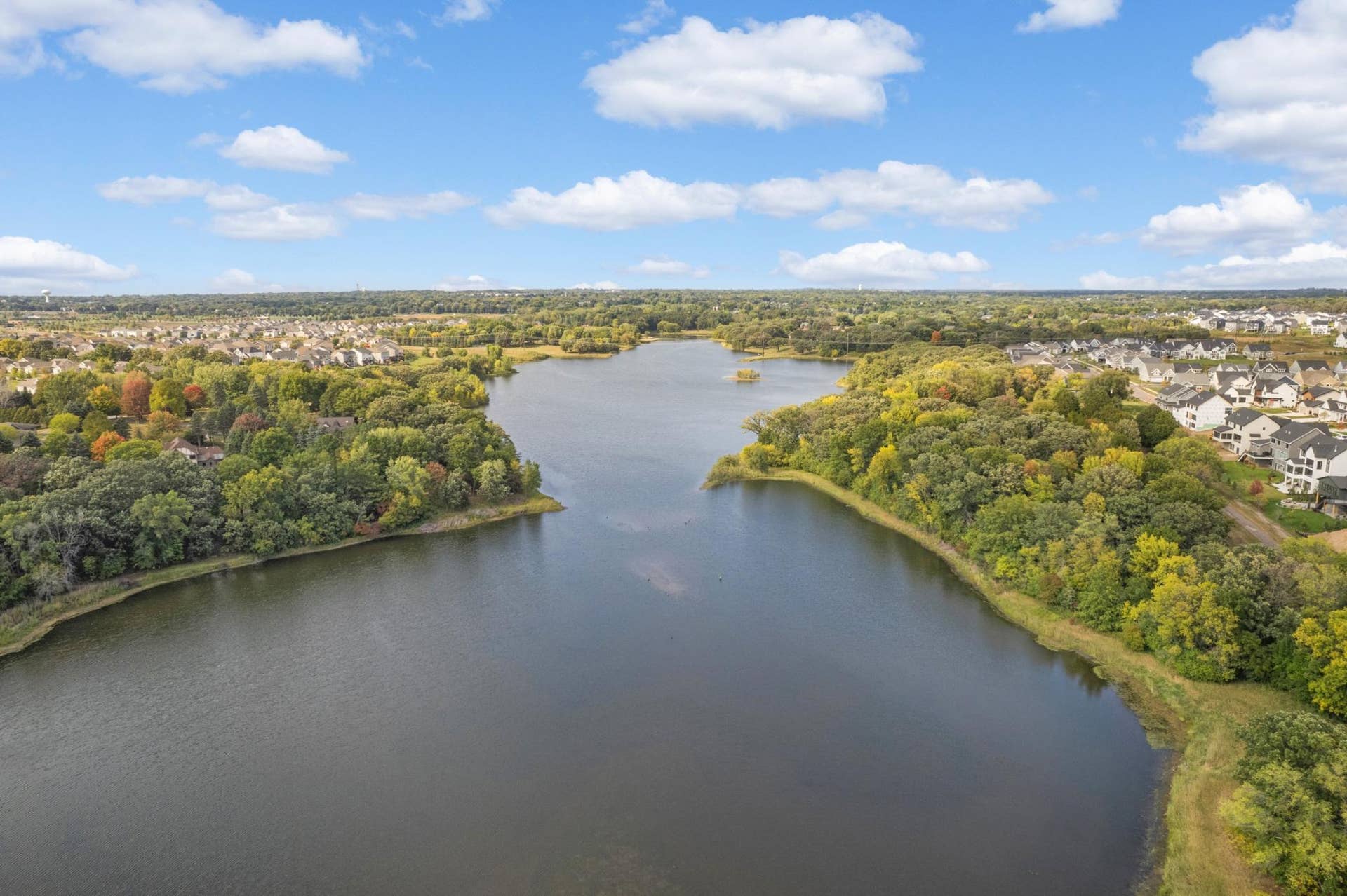 9354 Summerlin Road, Woodbury, MN 55129 Enjoy walking paths around the community pond