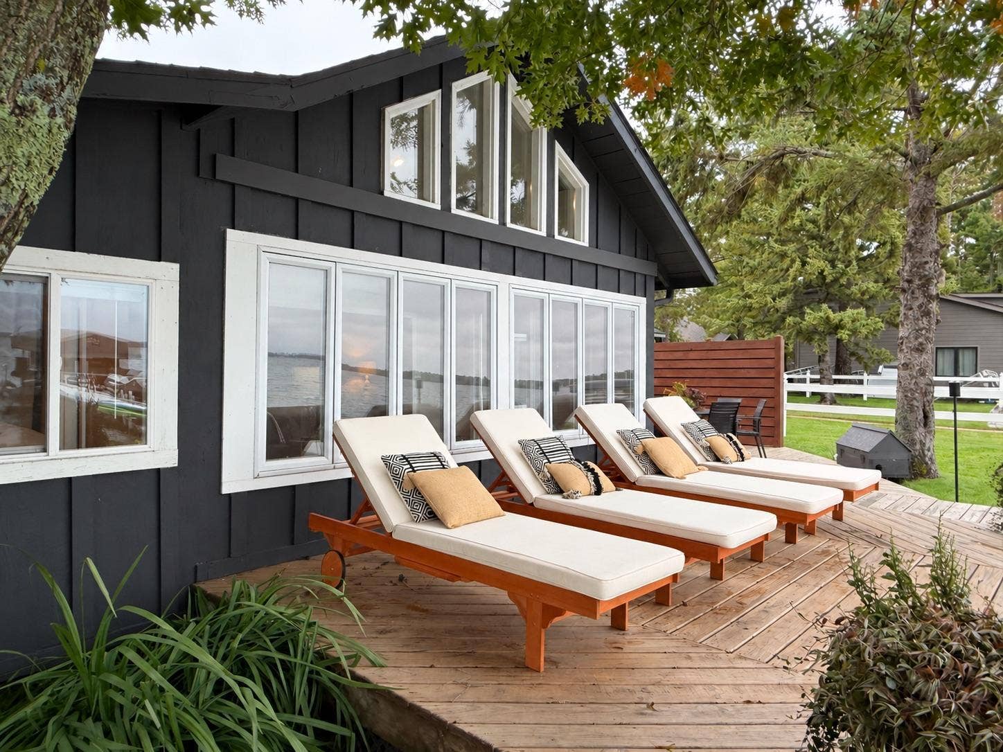 7206 Birchmont Ct. NE, Bemidji, MN 56601 exterior patio loungers angle.jpeg