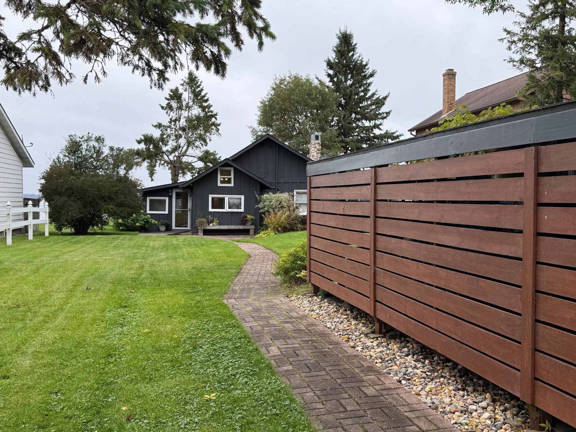 7206 Birchmont Ct. NE, Bemidji, MN 56601 exterior lean-to and house .jpeg