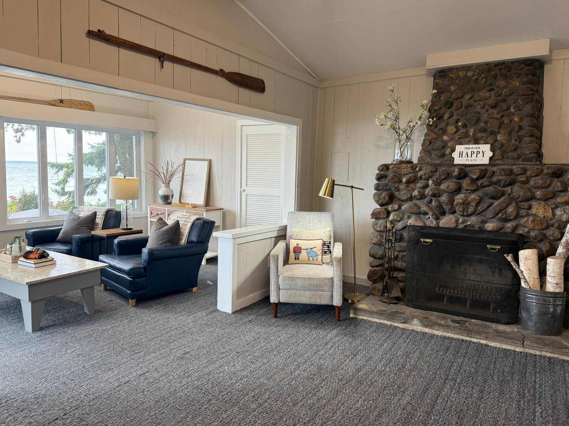 7206 Birchmont Ct. NE, Bemidji, MN 56601 living room - fireplace and sunroom.jpeg