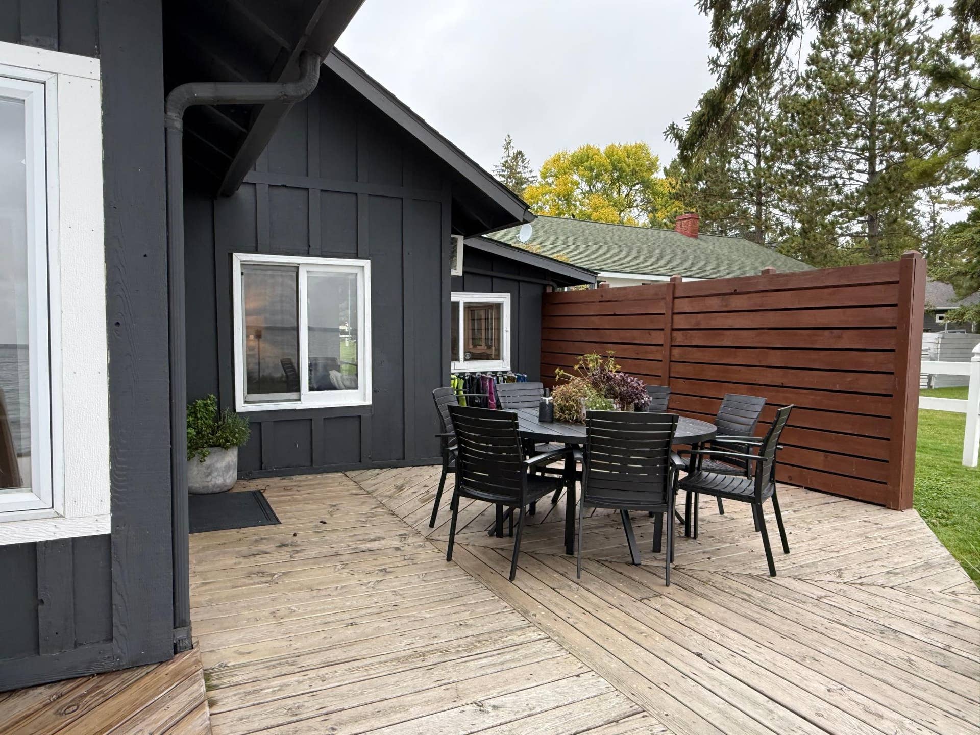 7206 Birchmont Ct. NE, Bemidji, MN 56601 exterior patio table and house .jpeg
