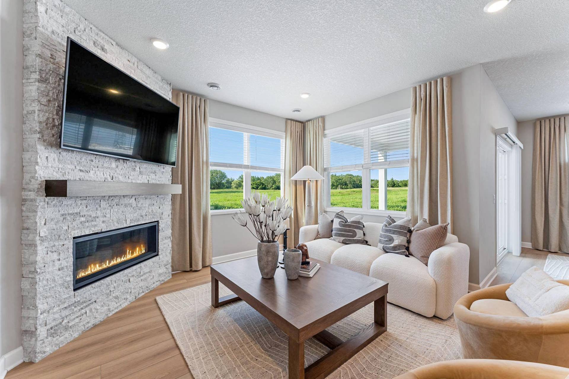 5222 Long Pointe Bay, Woodbury, MN 55129 The home embraces natural light from energy-efficient windows