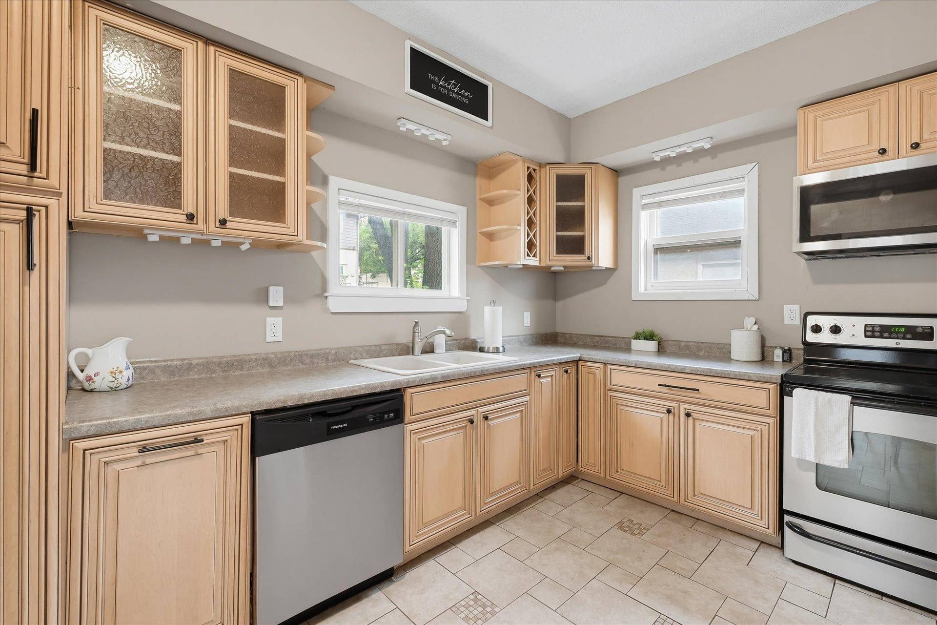 558 Concord Street, 104, Saint Paul, MN 55107 Warm wood cabinetry, spacious countertops, and newer stainless steel appliances come together beautifully in this stylish kitchen!