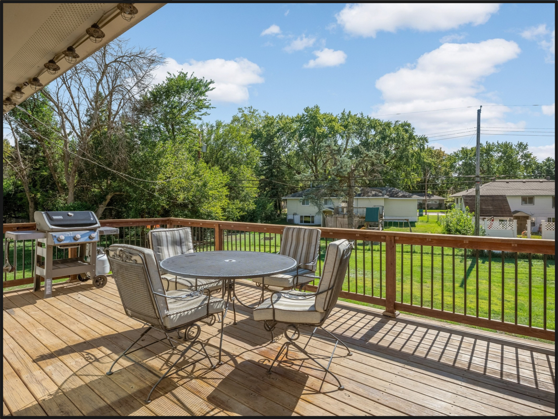 Deck overlooking back yard