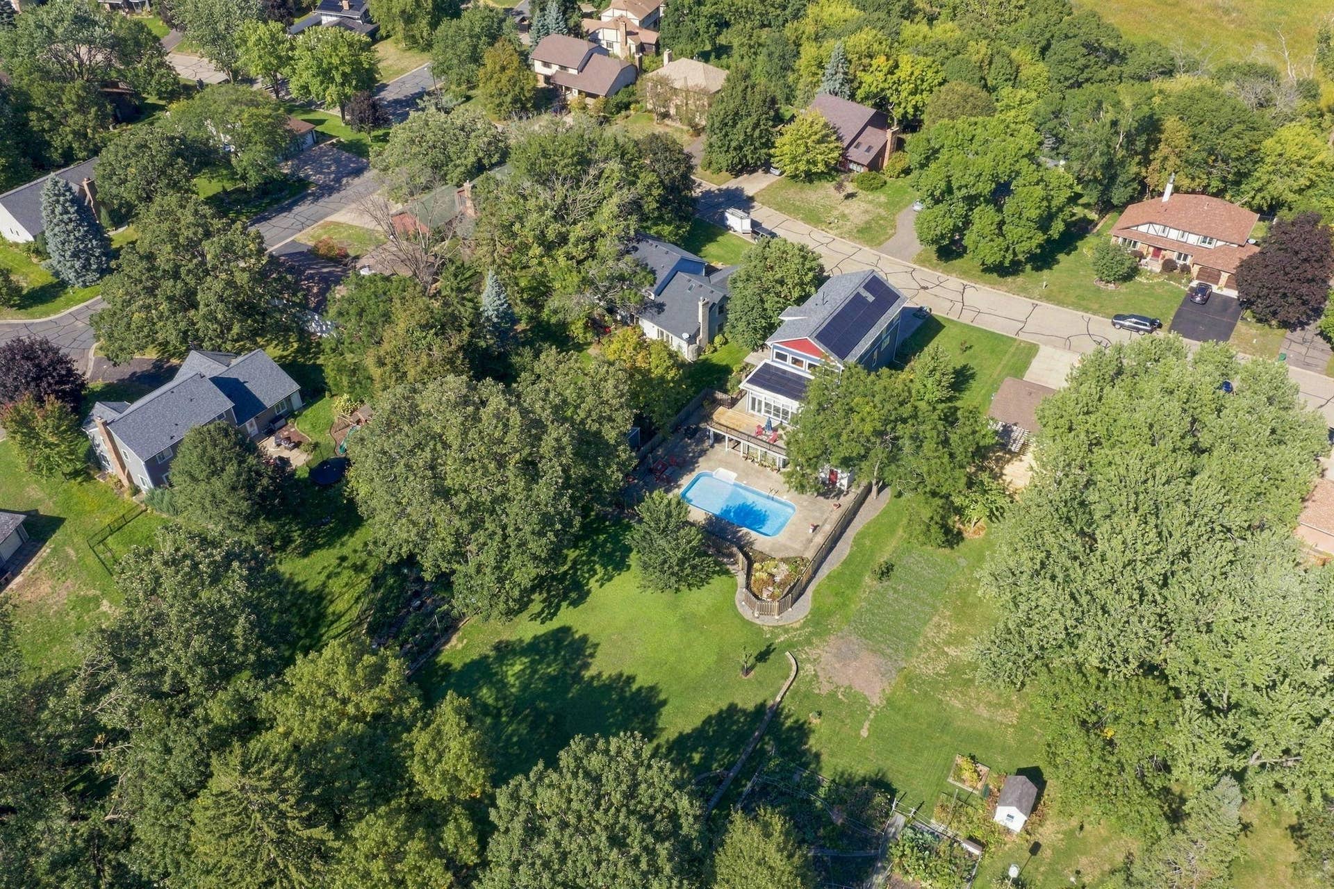 Unique overhead views shows the depth of the lot and extensive yard behind the pool area and fence. In the past it was used for large gardens with southwest exposure.