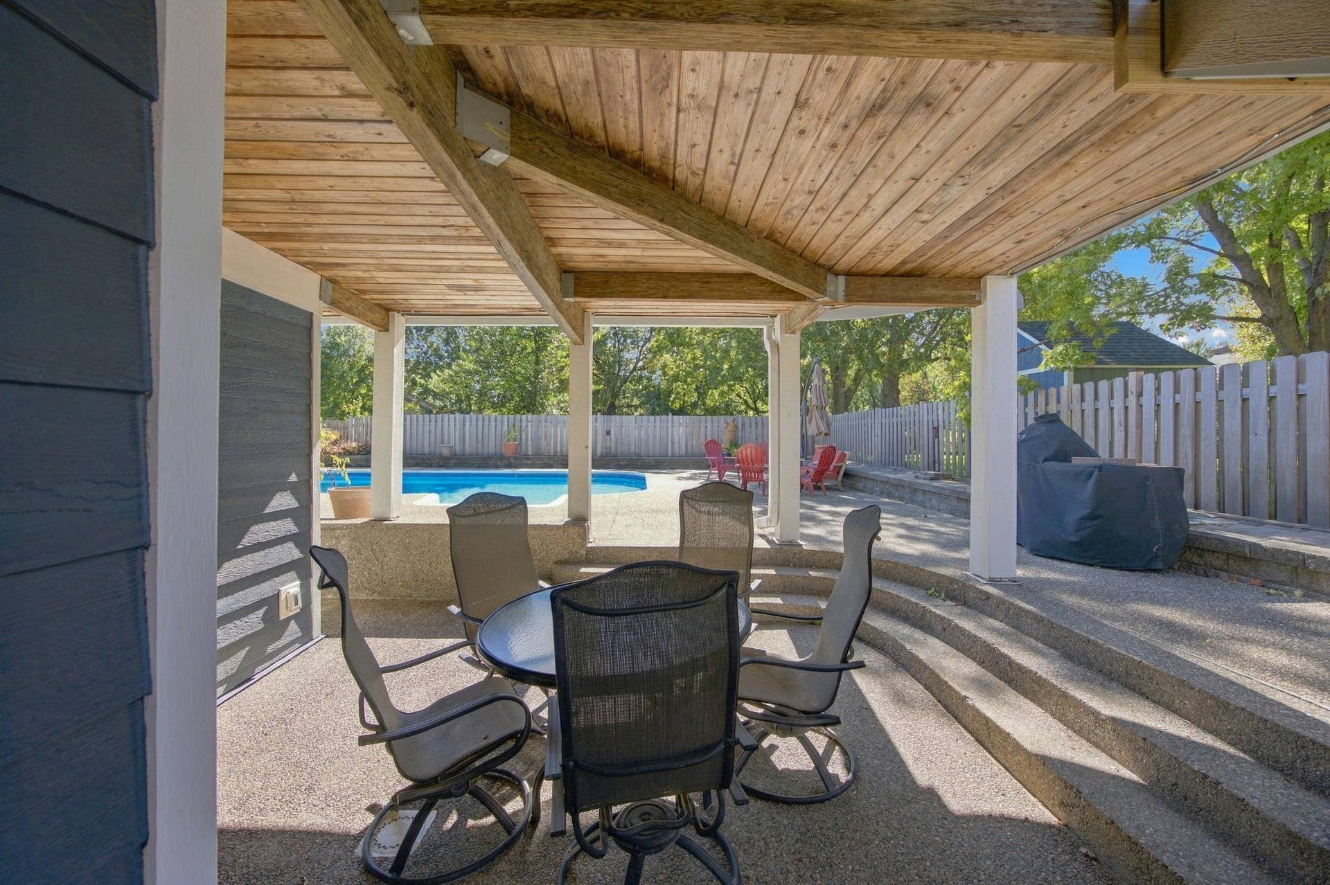 47- Nice spot out of the sun to enjoy a meal poolside, or play games.