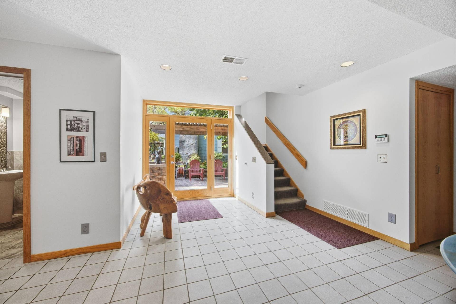 32-  Entry, 1/2 bath and staircase to upper levels.