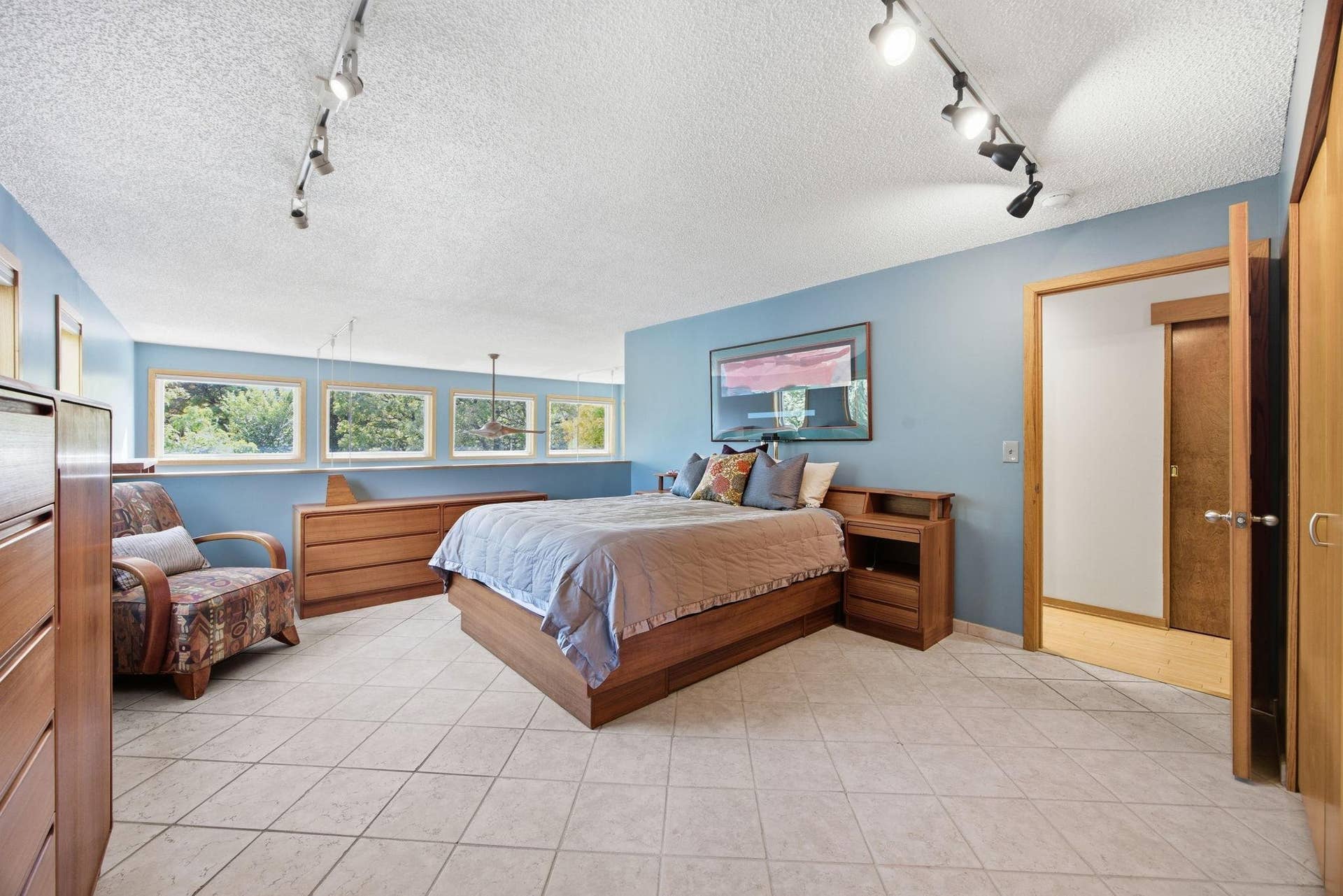 22-  Primary Bedroom with Tiled floors.