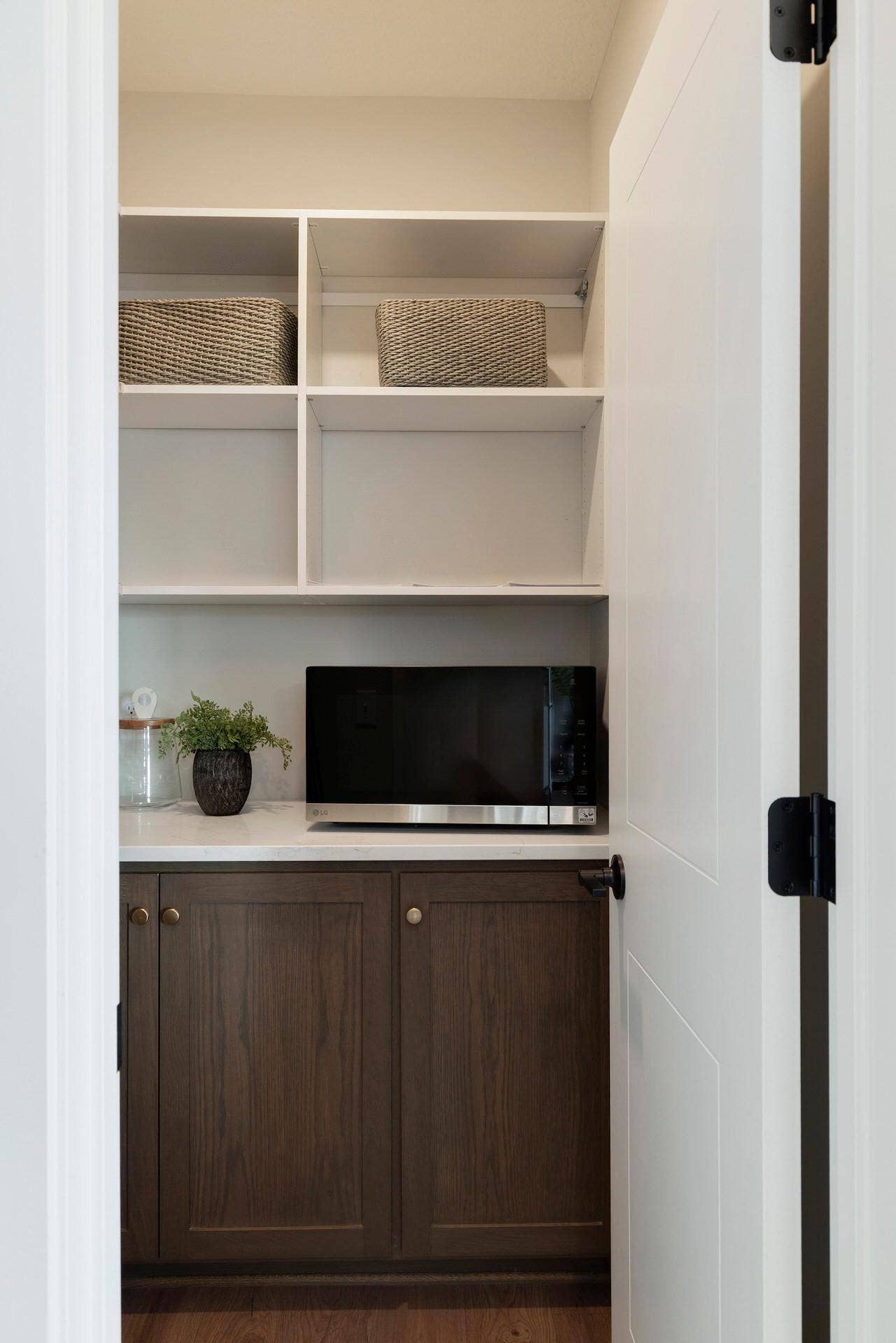 3476 Knightsbridge Trail N, Lake Elmo, MN 55042 Walk-in pantry with two tones of wood.