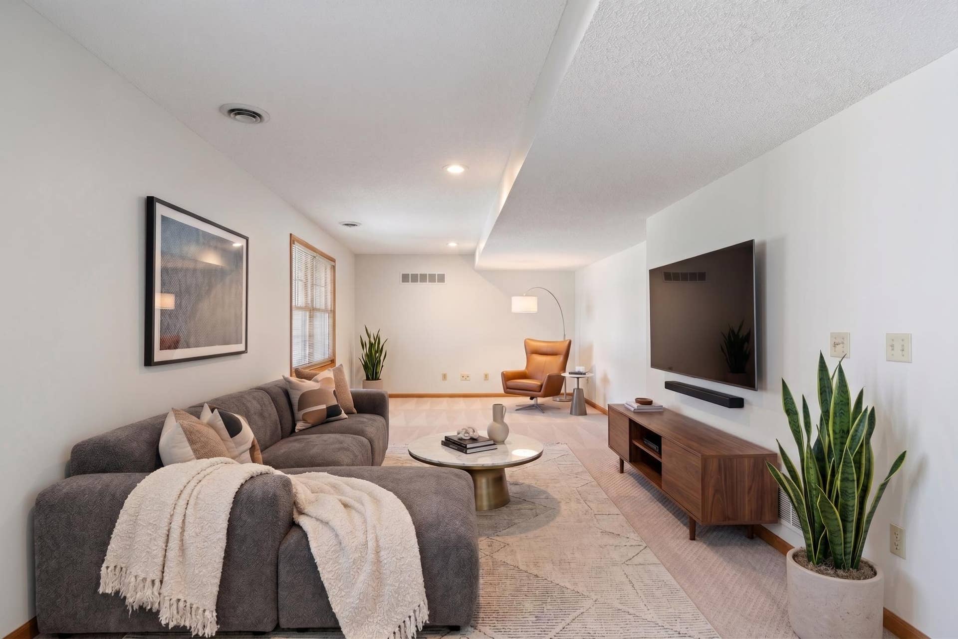 1781 Brighton Trail, Woodbury, MN 55125 Lower Level Recreation Room - Virtually Staged