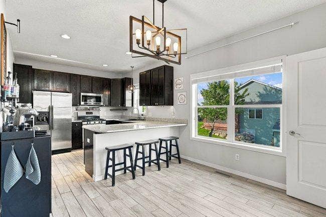936 Harvest Drive SW, Lonsdale, MN 55046 Dining Room and Island