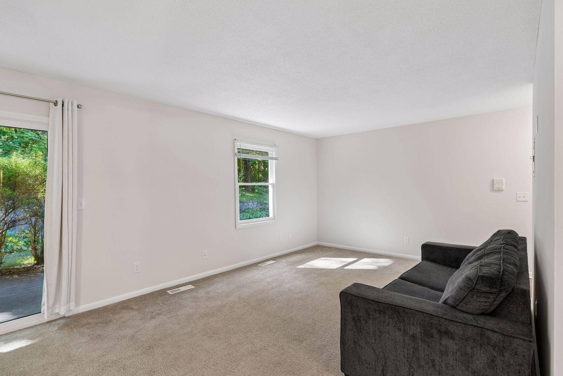 6347 Alderwood Circle, #B, Woodbury, MN 55125 Living Room has been configured in multiple ways in the past.