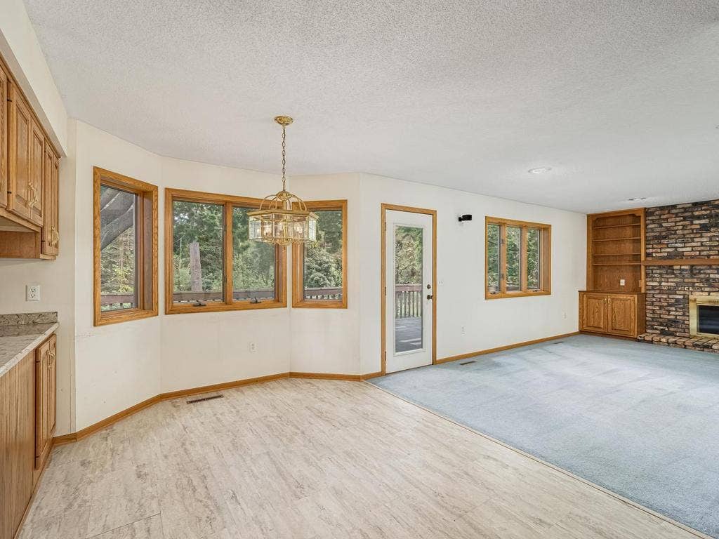 9508 Riverview Avenue, Bloomington, MN 55425 Living room with access to deck