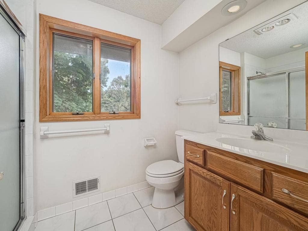 9508 Riverview Avenue, Bloomington, MN 55425 Primary 3/4 Bath with tile flooring