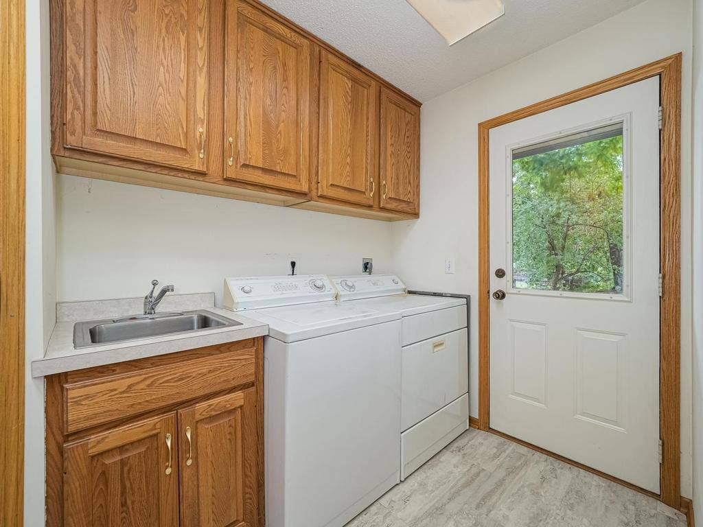 9508 Riverview Avenue, Bloomington, MN 55425 Main level laundry with utility sink