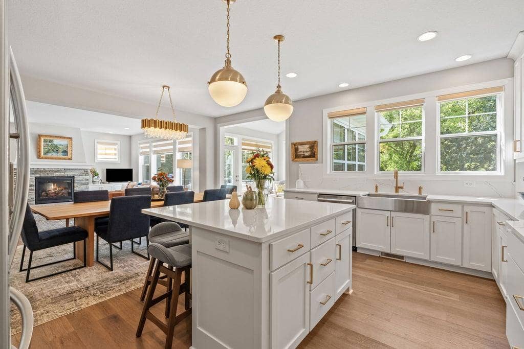 Generously sized kitchen with abundant cabinetry, workspace and room to gather.
