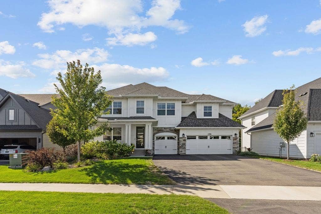 Beautiful, low maitanence exterior with stone front elevation.