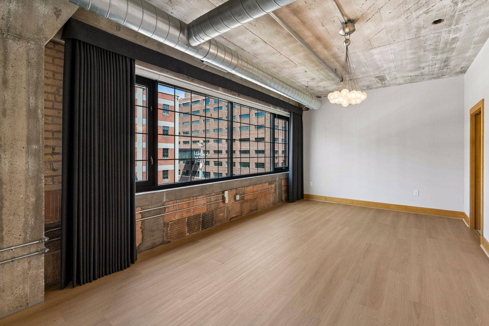 525 3rd Street N, #314, 59, Minneapolis, MN 55401 Expansive Primary Bedroom with custom drapery and window shades
