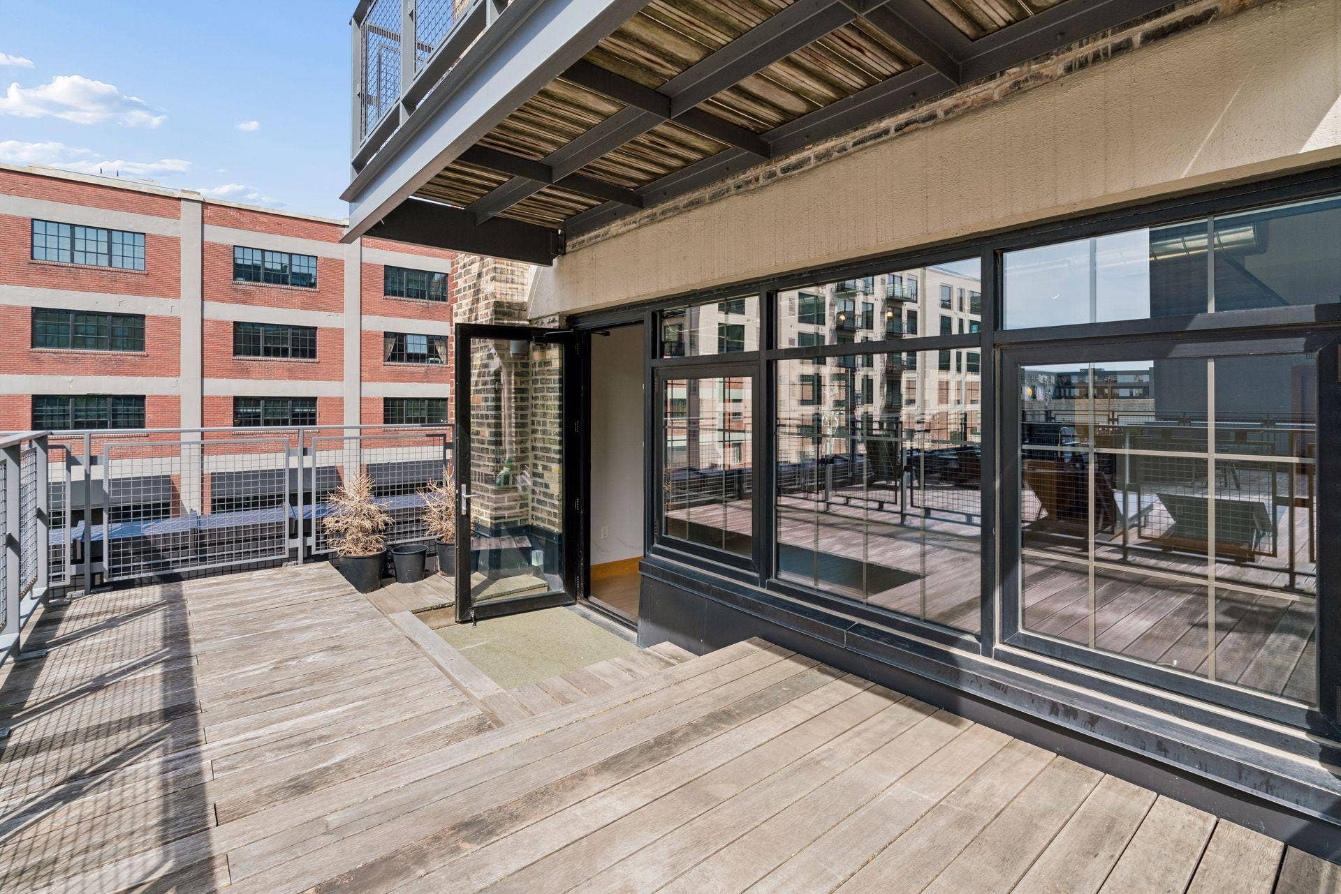 525 3rd Street N, #314, 59, Minneapolis, MN 55401 Private Terrace off Living Room with access to the community terrace with grills and fire table for your enjoyment