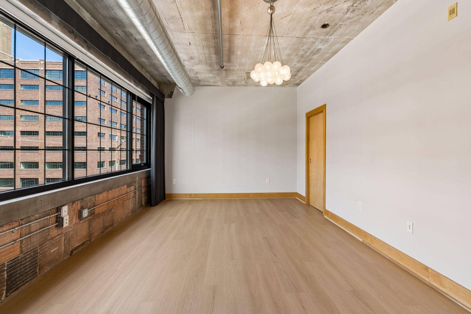 525 3rd Street N, #314, 59, Minneapolis, MN 55401 Expansive Primary Bedroom with custom drapery and window shades