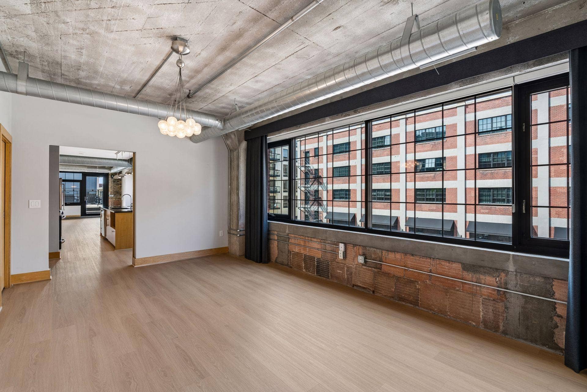 525 3rd Street N, #314, 59, Minneapolis, MN 55401 Expansive Primary Bedroom with custom drapery and window shades