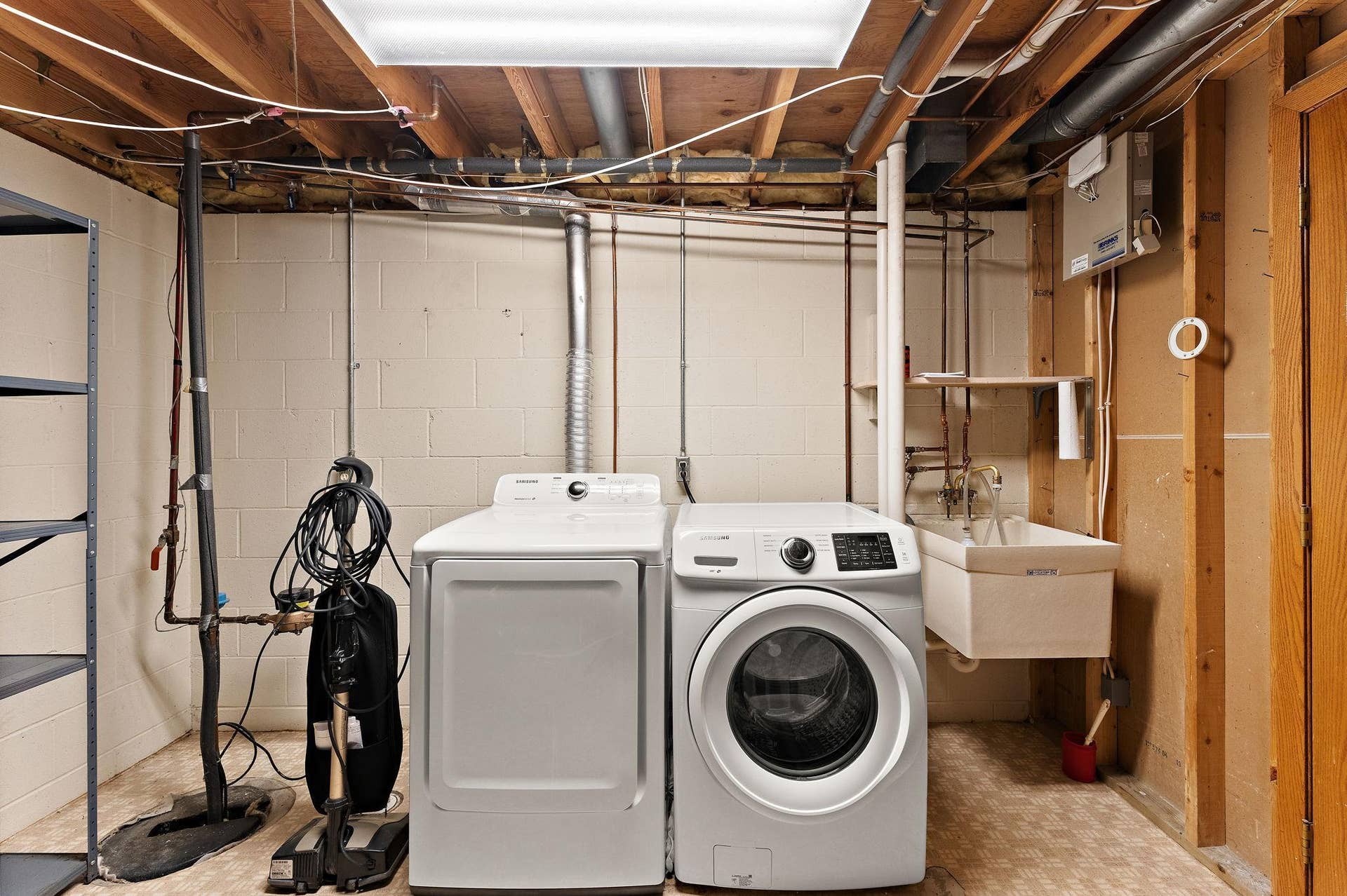 978 Winterberry Drive, Woodbury, MN 55125 Lower level laundry room - possible space up in bathroom to move units - or convert one closet to laundry