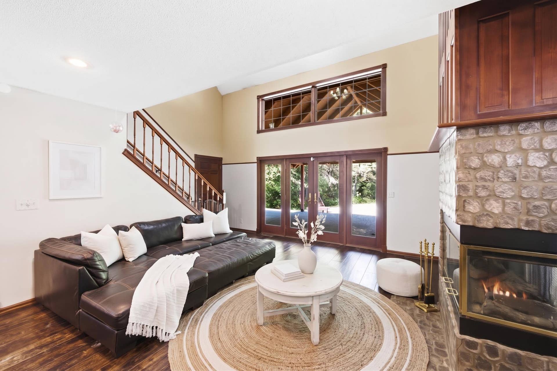 5994 425th St - Living Room with Vaulted Ceilings, Hardwood Floors, and Floor to Ceiling Custom Fireplace