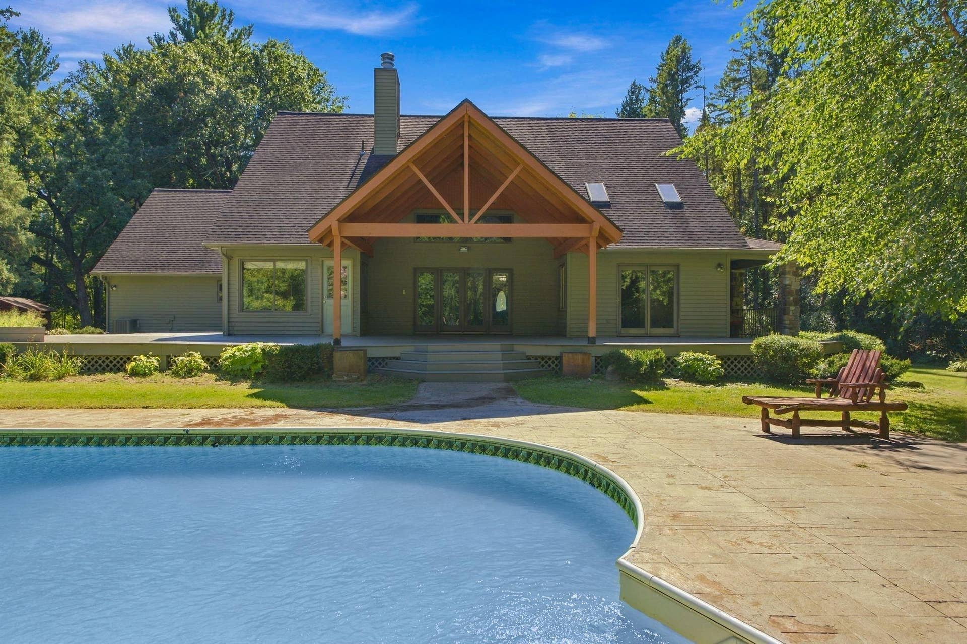 5994 425th St - Pretty View of Home From In-Ground Heated Pool