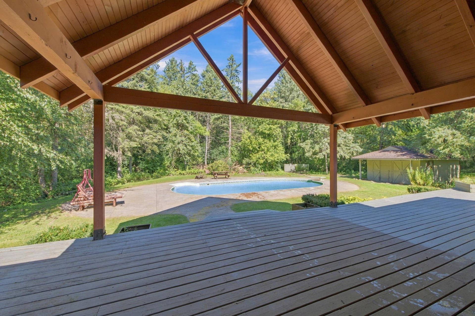 5994 425th St - Fantastic Covered Sitting Area Overlooking the Pool