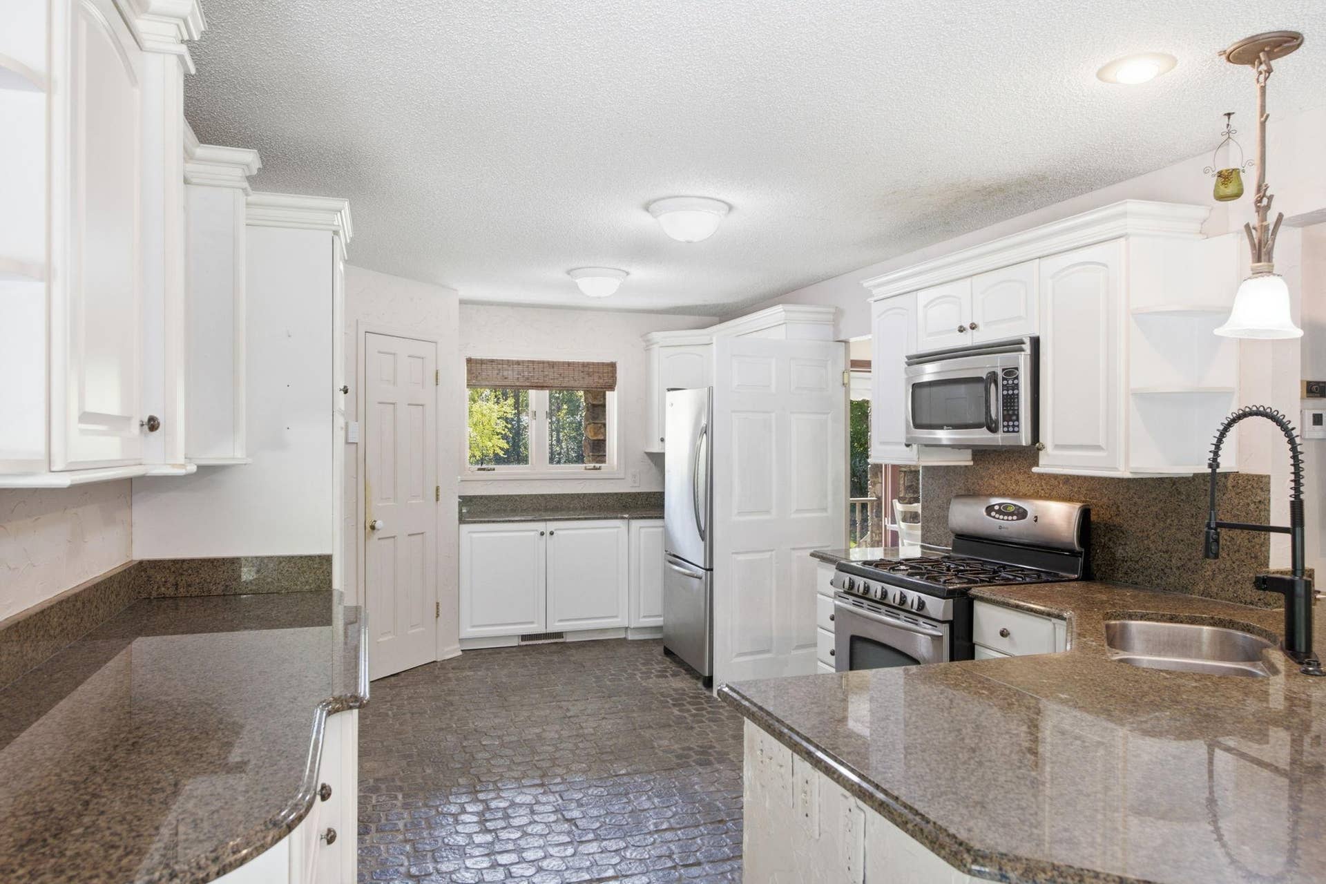 5994 425th St - Kitchen with Newer Appliances and Cobblestone Floors