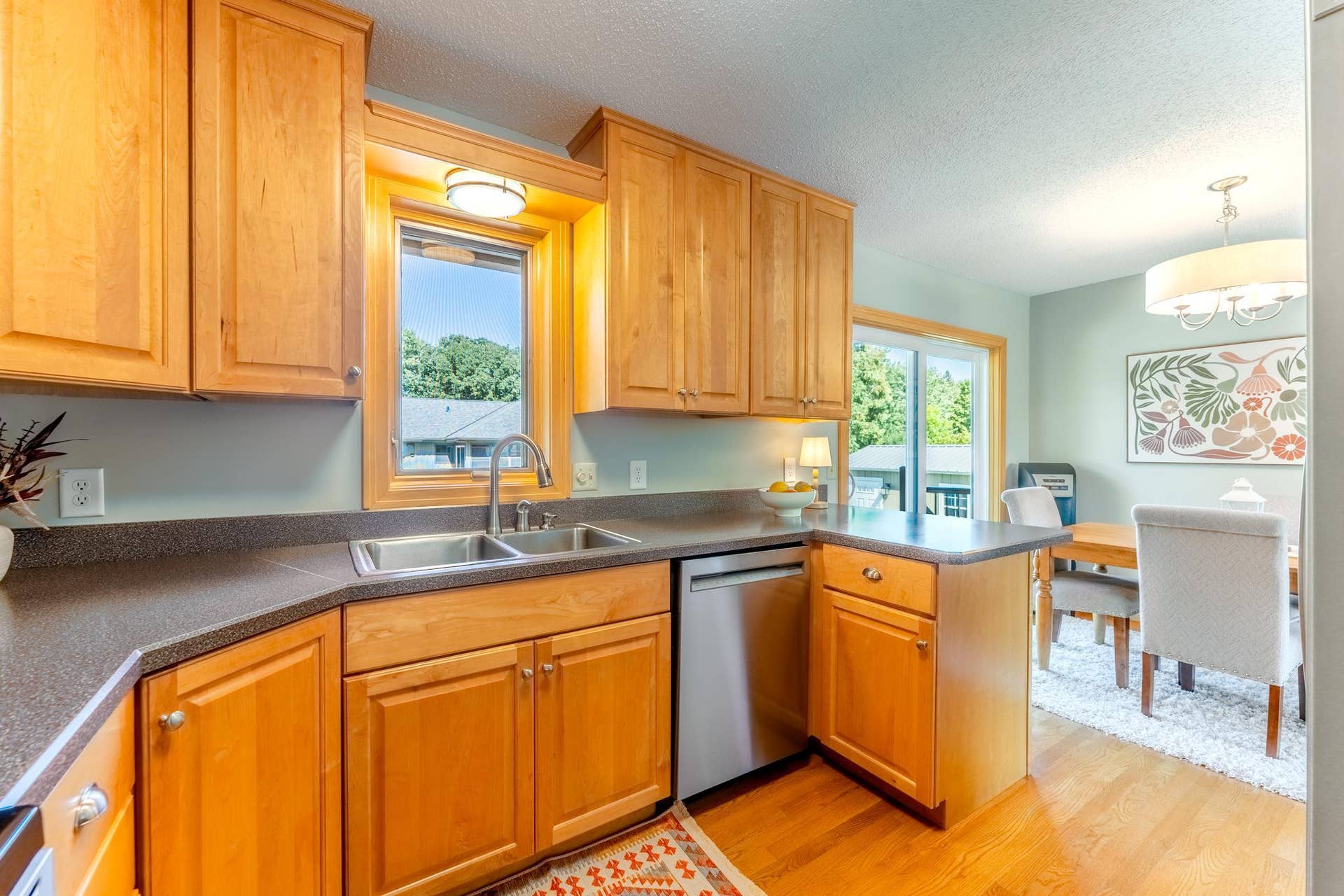 14250 55th Street N, Stillwater, MN 55082 Kitchen window overlooks deck and backyard.